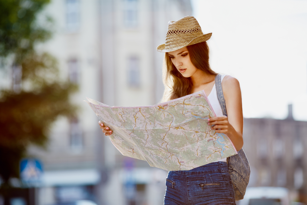 Woman looking at map