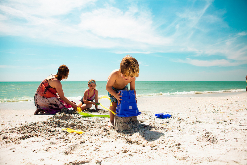 mom and kids on beach