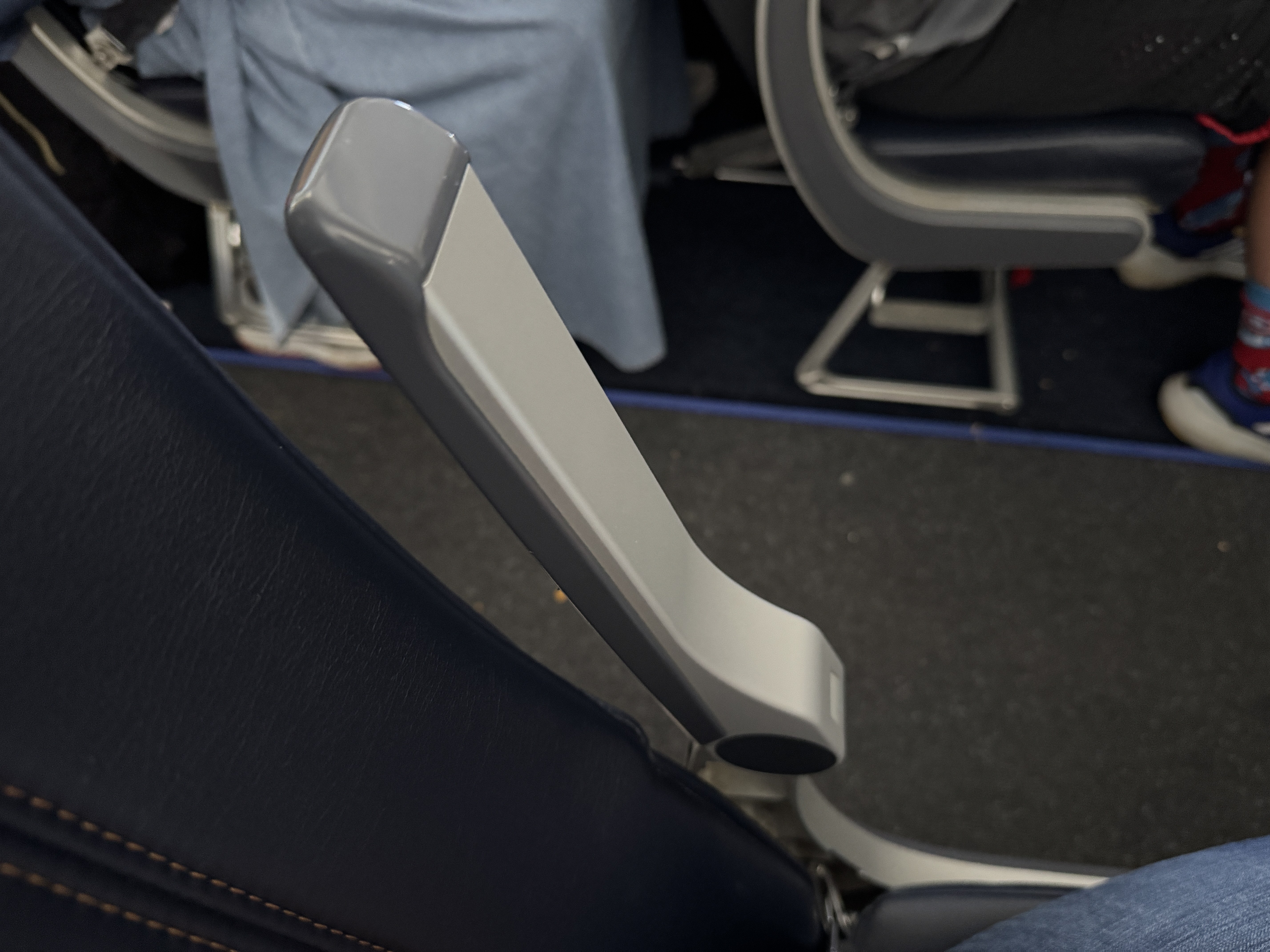 Allegiant A320 AVL HOU adjustable armrest