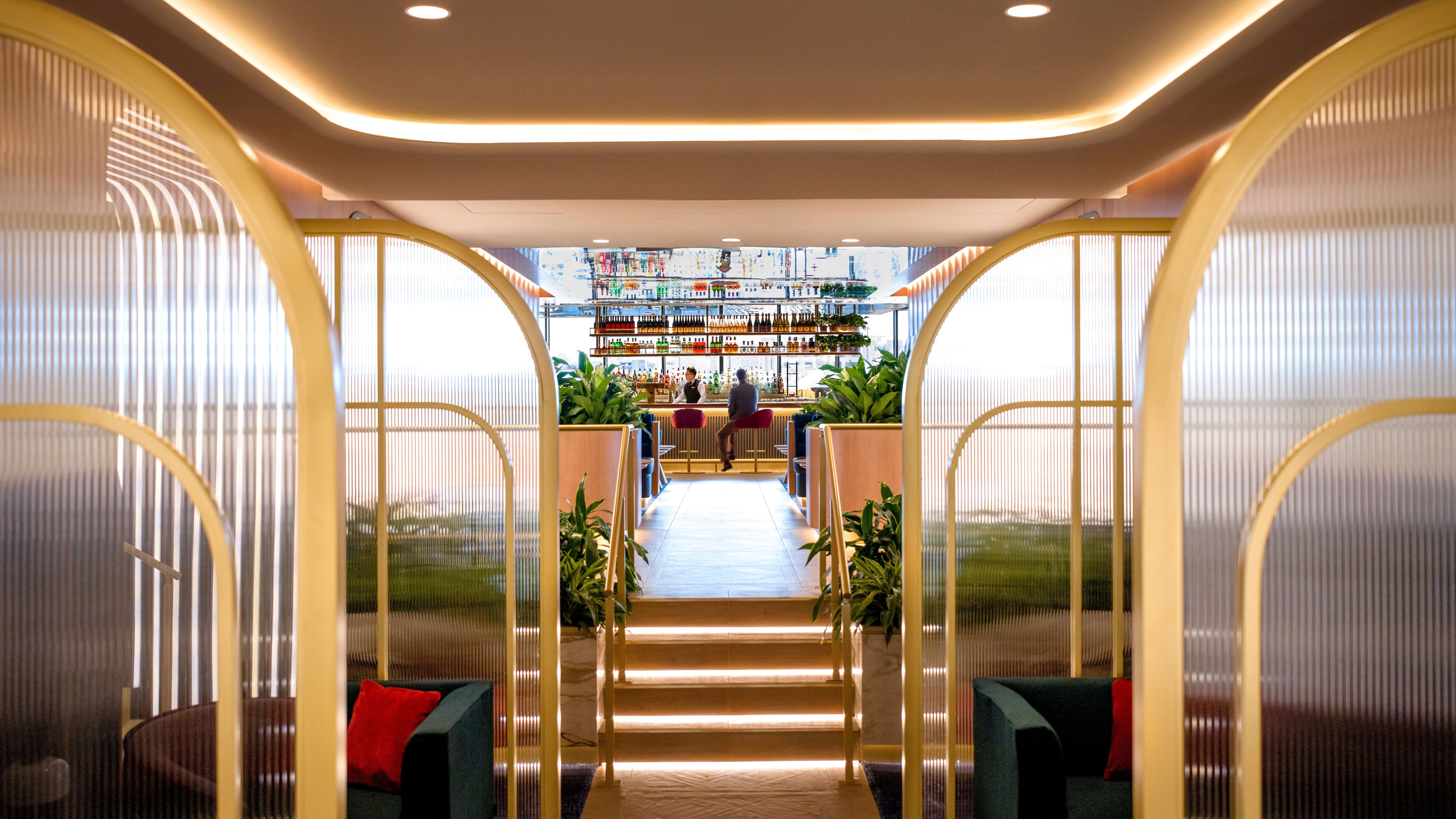 British Airways New Miami Lounge view up steps to bar British Airways New Miami Lounge view up steps to bar