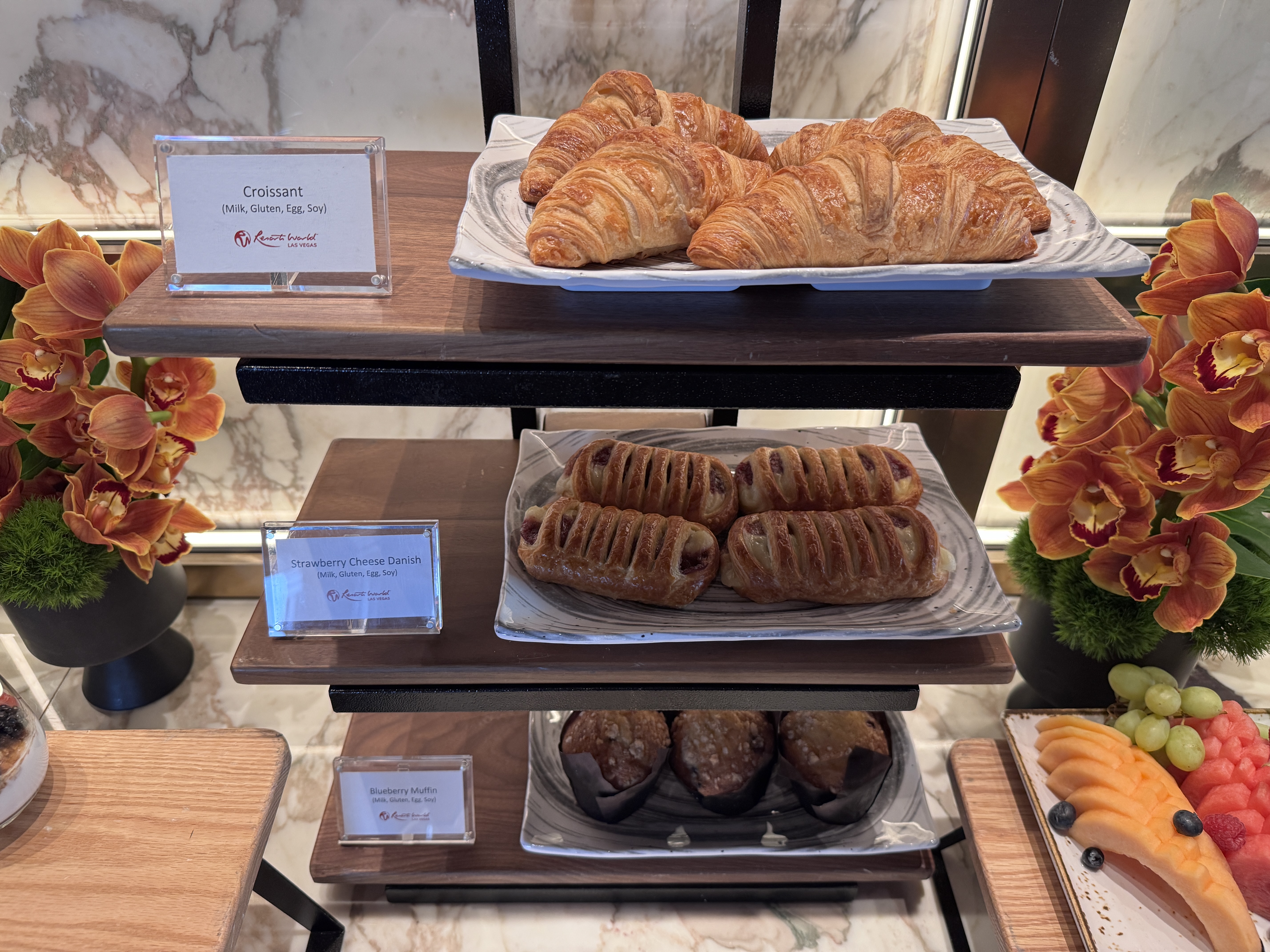 Conrad Las Vegas Club 66 breakfast pastry rack with croissants danish and muffins