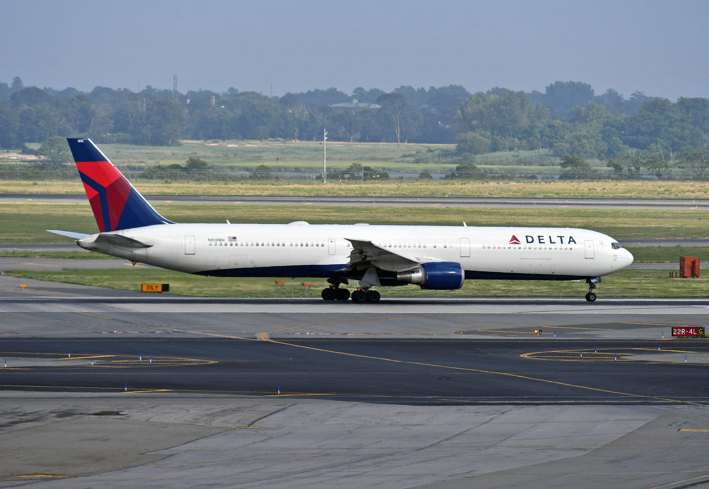 Delta B767 400ER takeoff 22R JFK Delta Boeing 767-400ER on a runway
