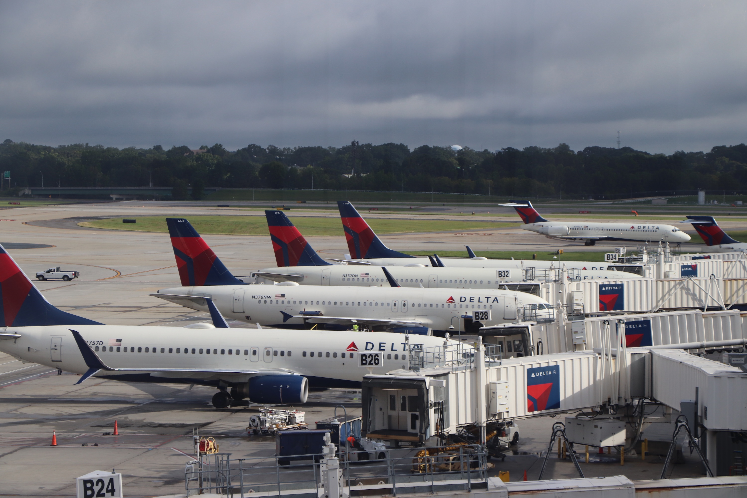 Delta planes at B gates ATL runway view Delta planes at B gates ATL runway view