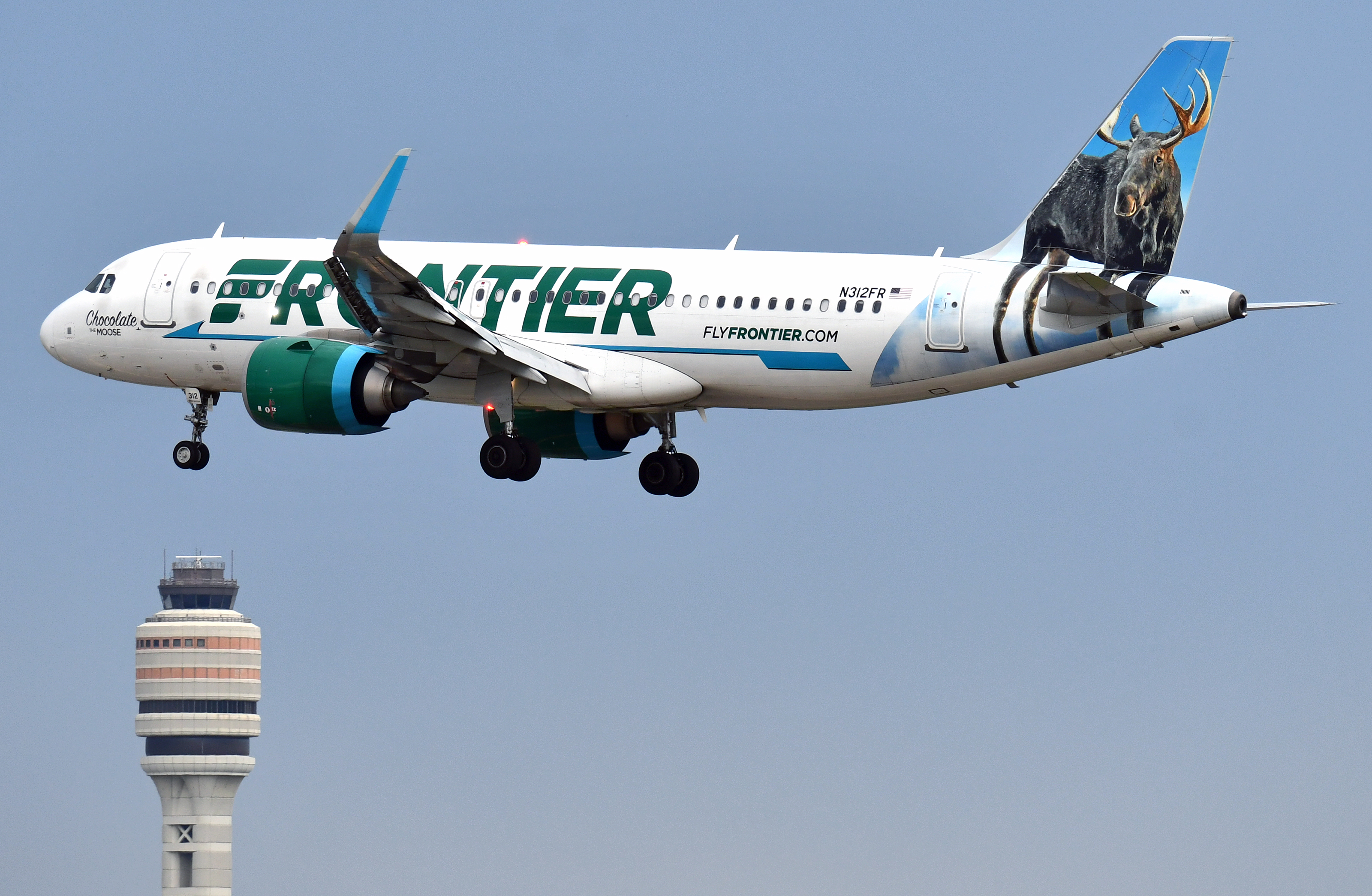 Frontier A320neo Chocolate the Moose landing MCO tower Frontier A320neo Chocolate the Moose landing MCO tower
