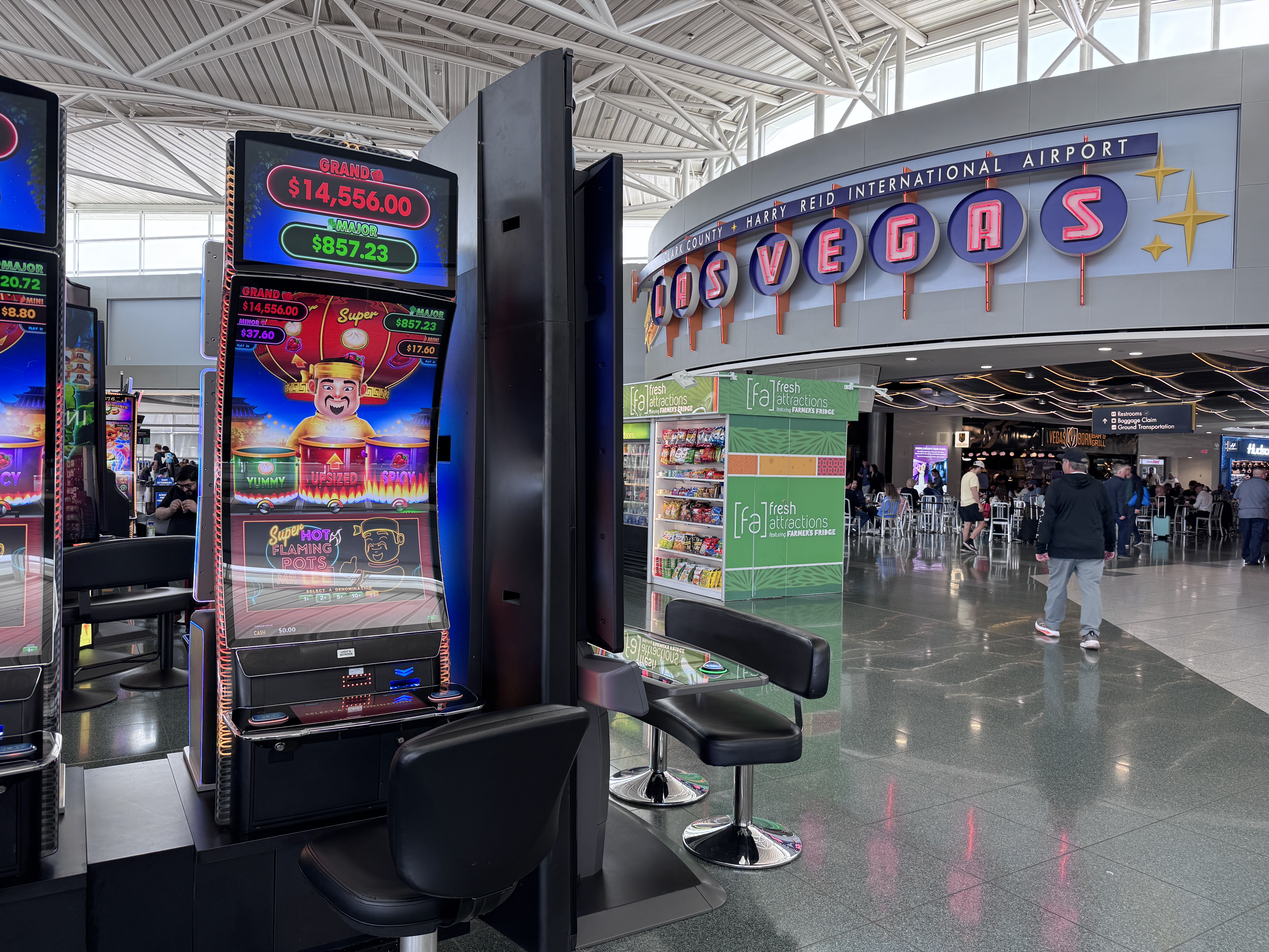 Harry Reid International Airport LAS terminal slot machines Vegas signage