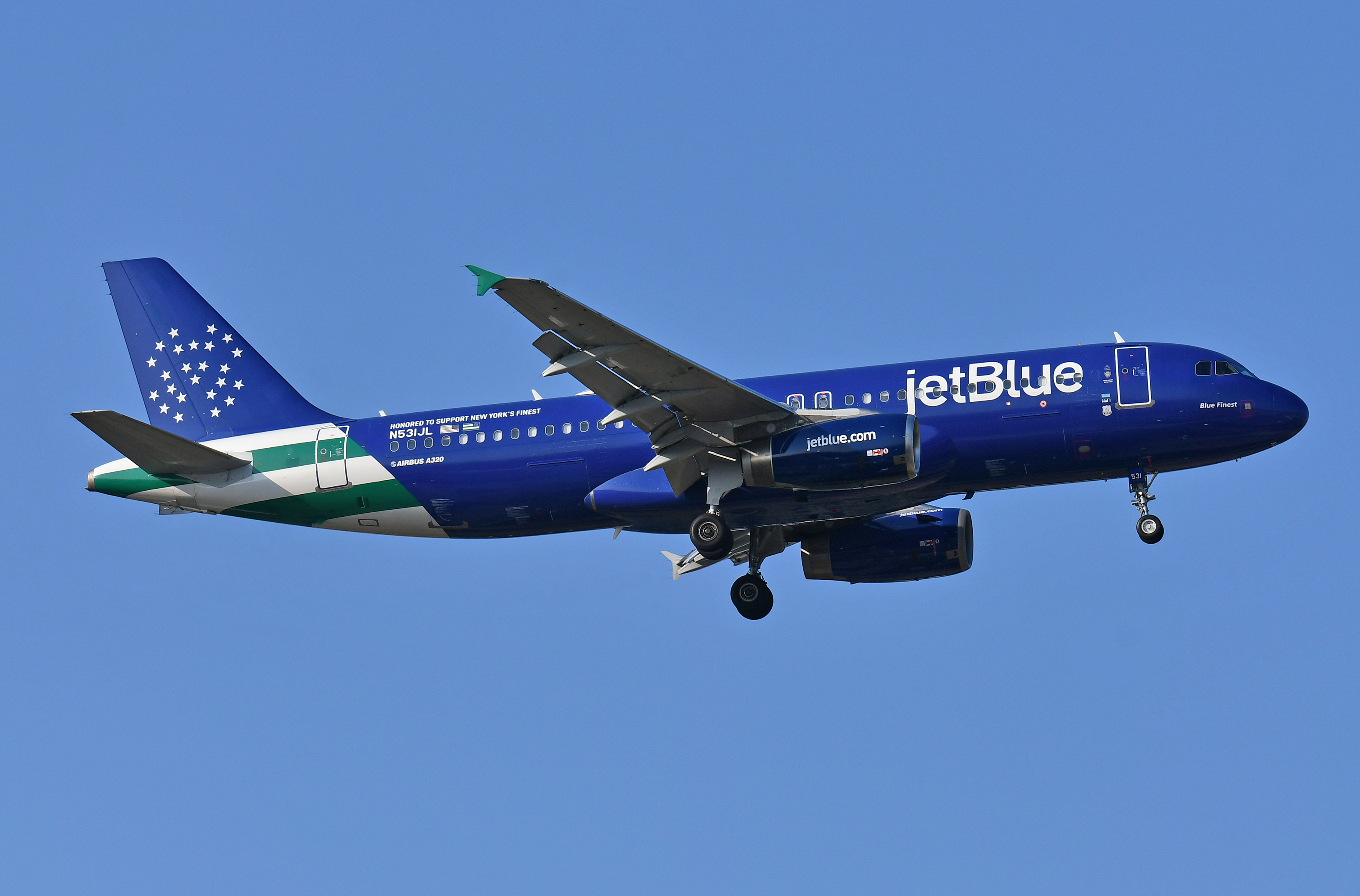 JetBlue New Yorks finest special colors A320 landing JFK JetBlue New Yorks finest special colors A320 landing JFK