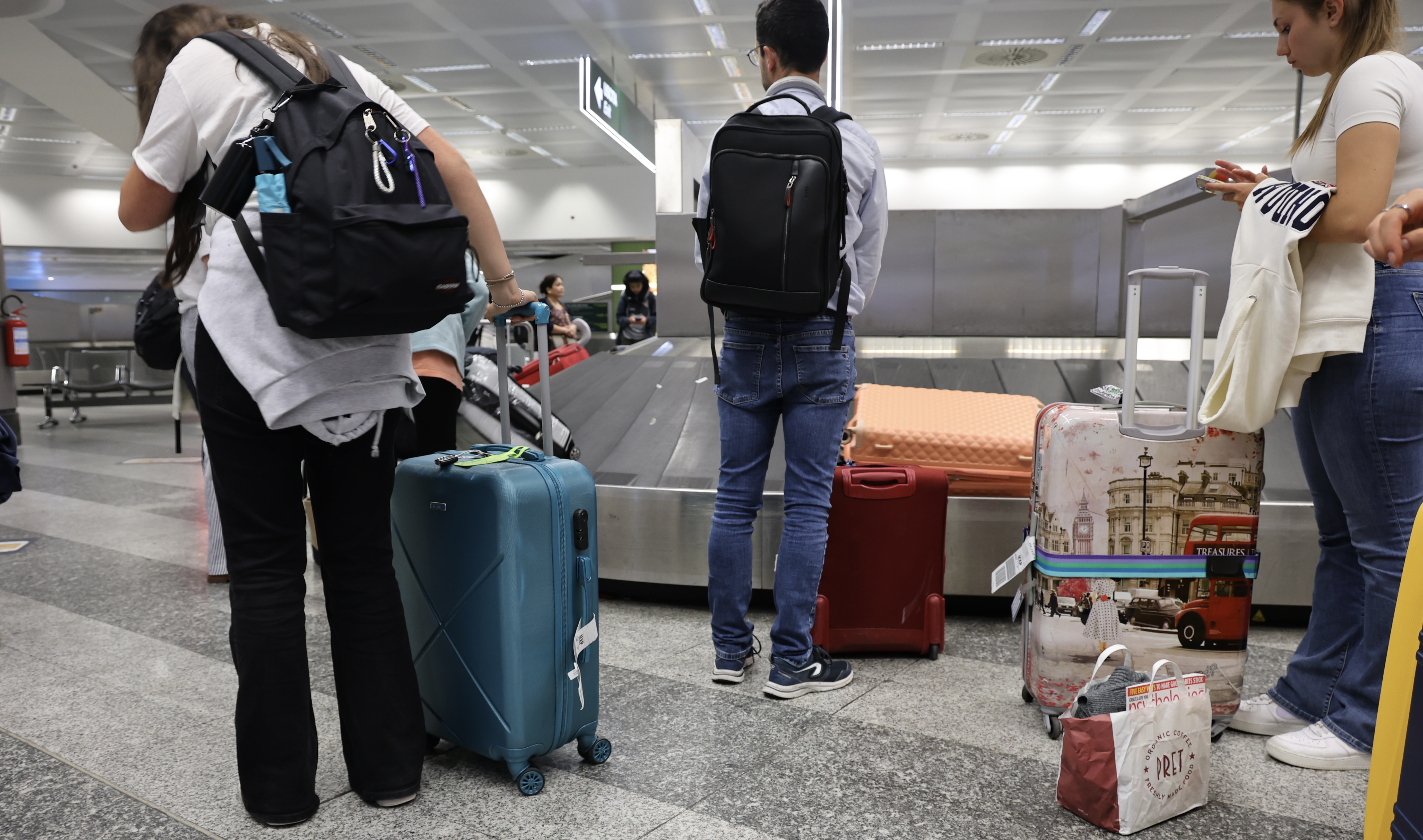 Passengers Collecting Checked Baggage Upgraded Points LLC Passengers Collecting Checked Baggage Upgraded Points LLC