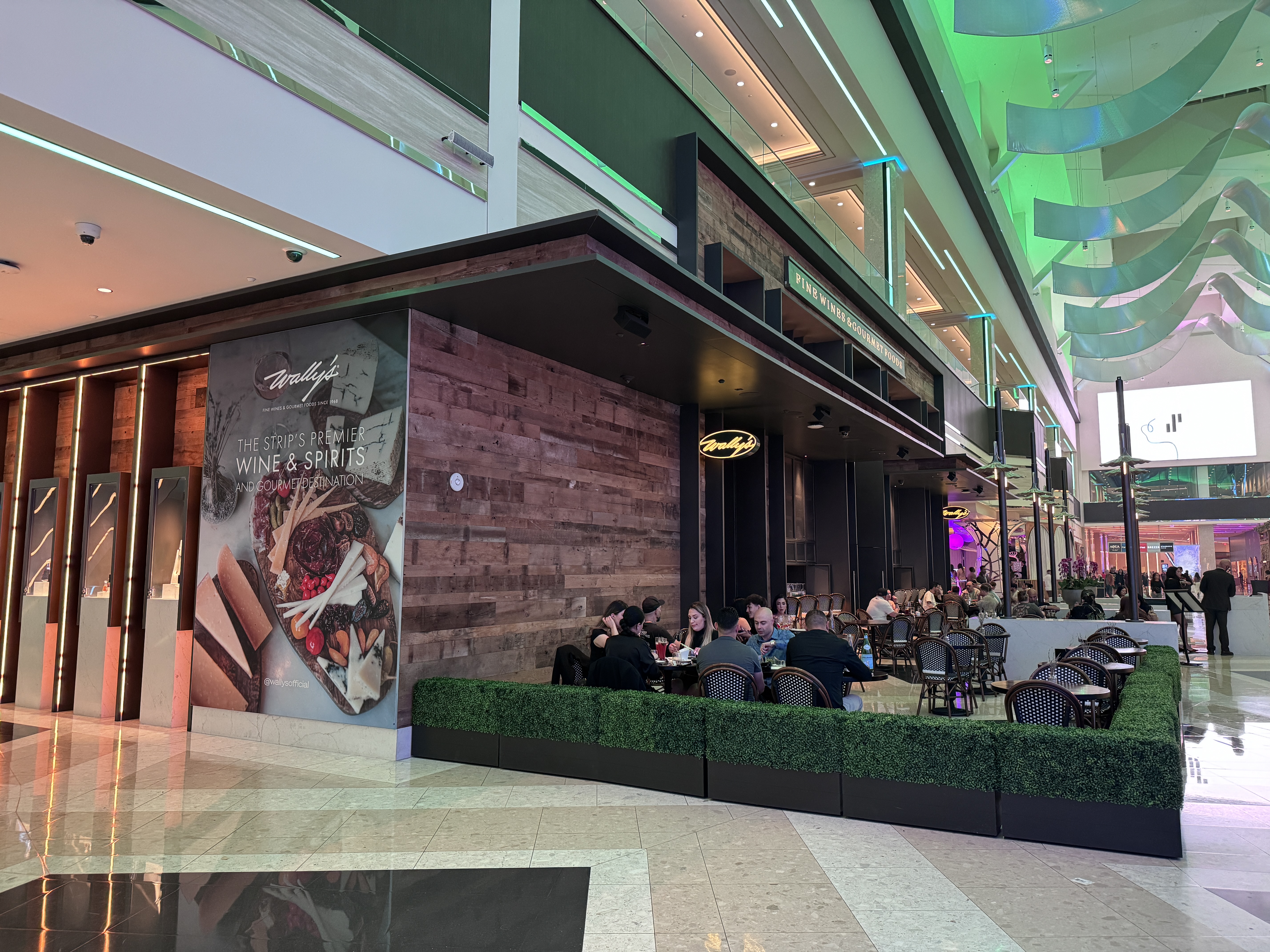 Resorts World Las Vegas Wallys wine bar exterior with patio seating