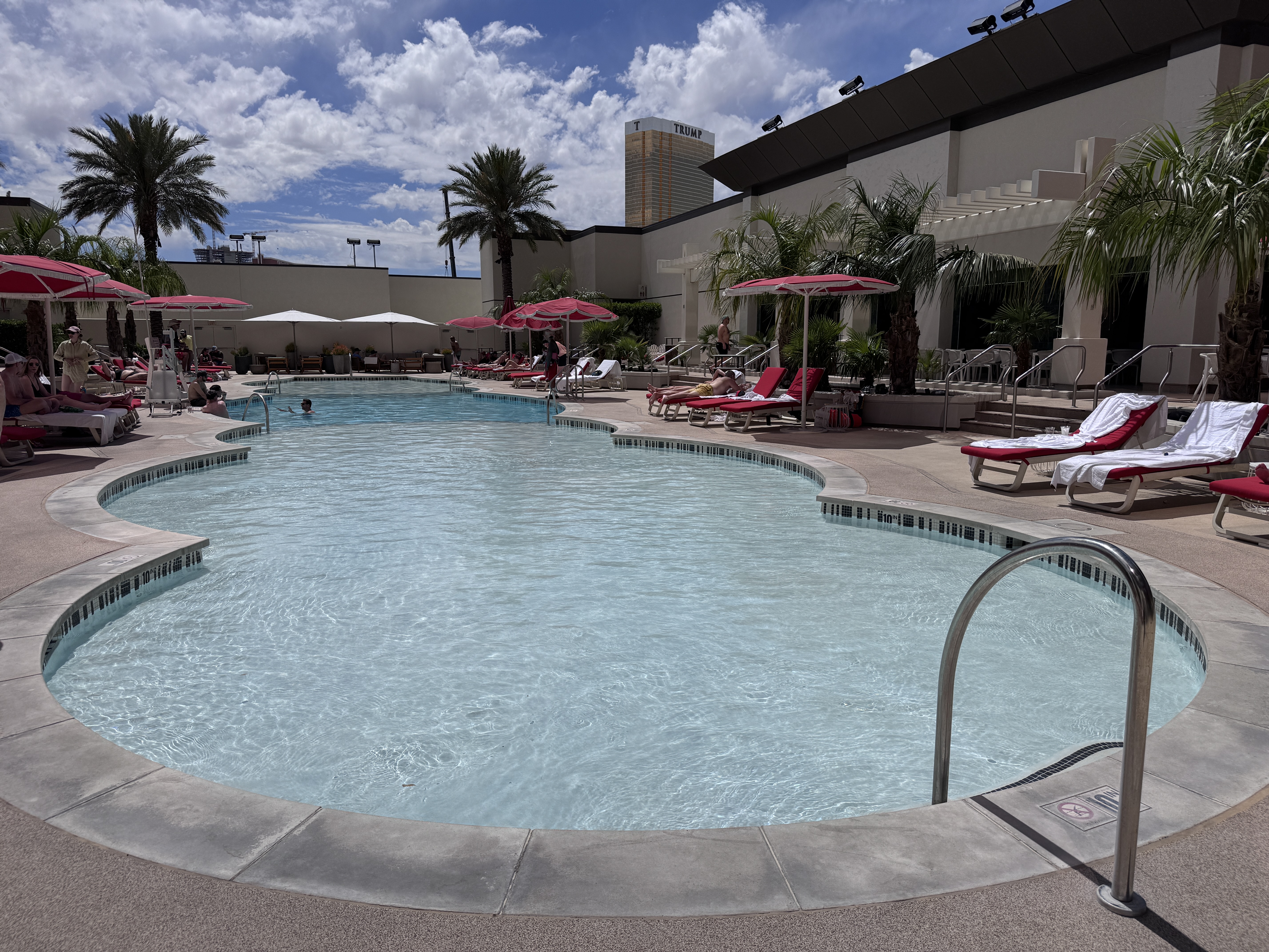 Resorts World Las Vegas pool smaller quiet pool with lounge chairs Resorts World Las Vegas pool smaller quiet pool with lounge chairs