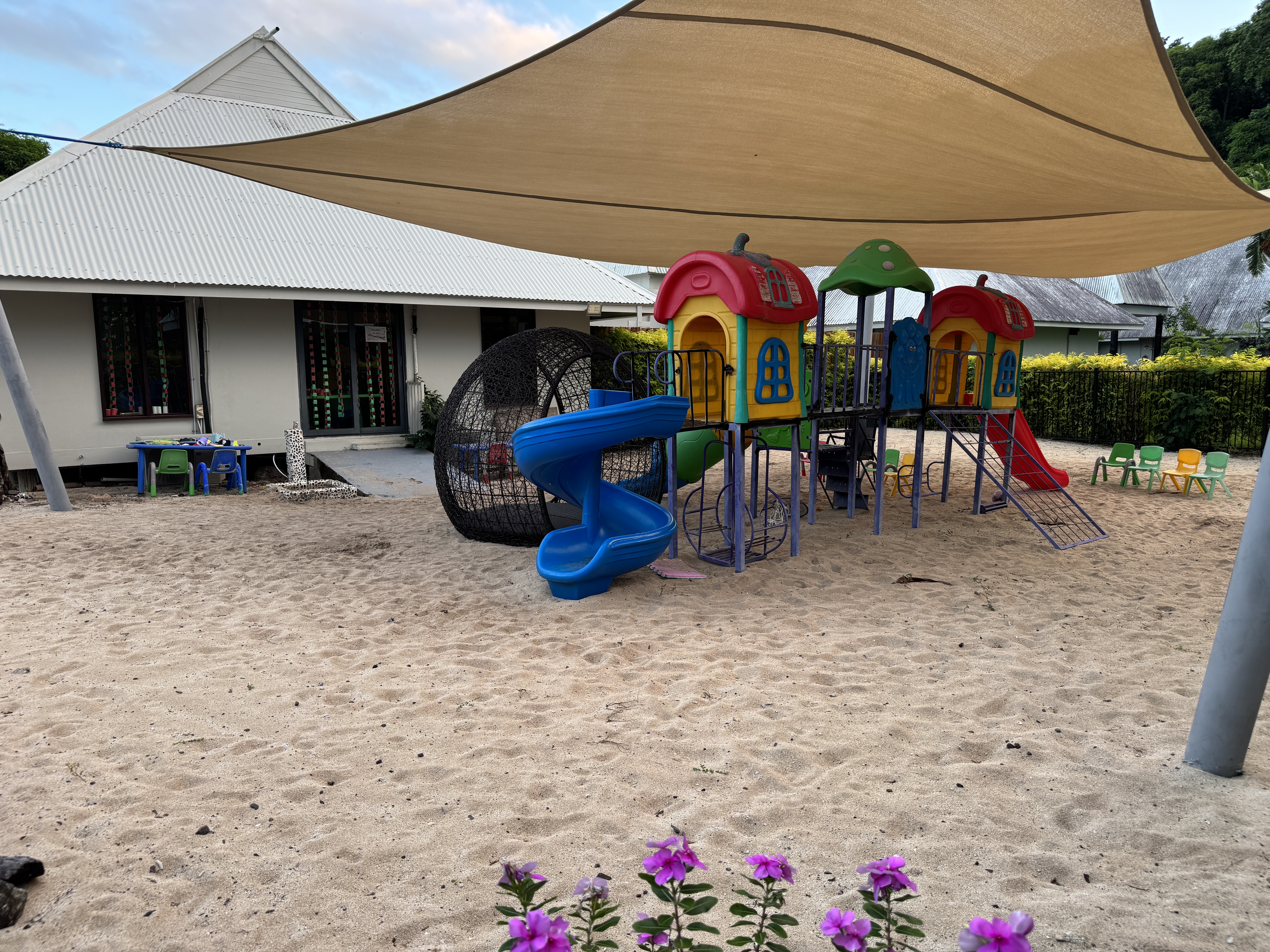Sheraton Tokoriki Island Kids club playground with slide cubby houses in sand Sheraton Tokoriki Island Kids club playground with slide cubby houses in sand