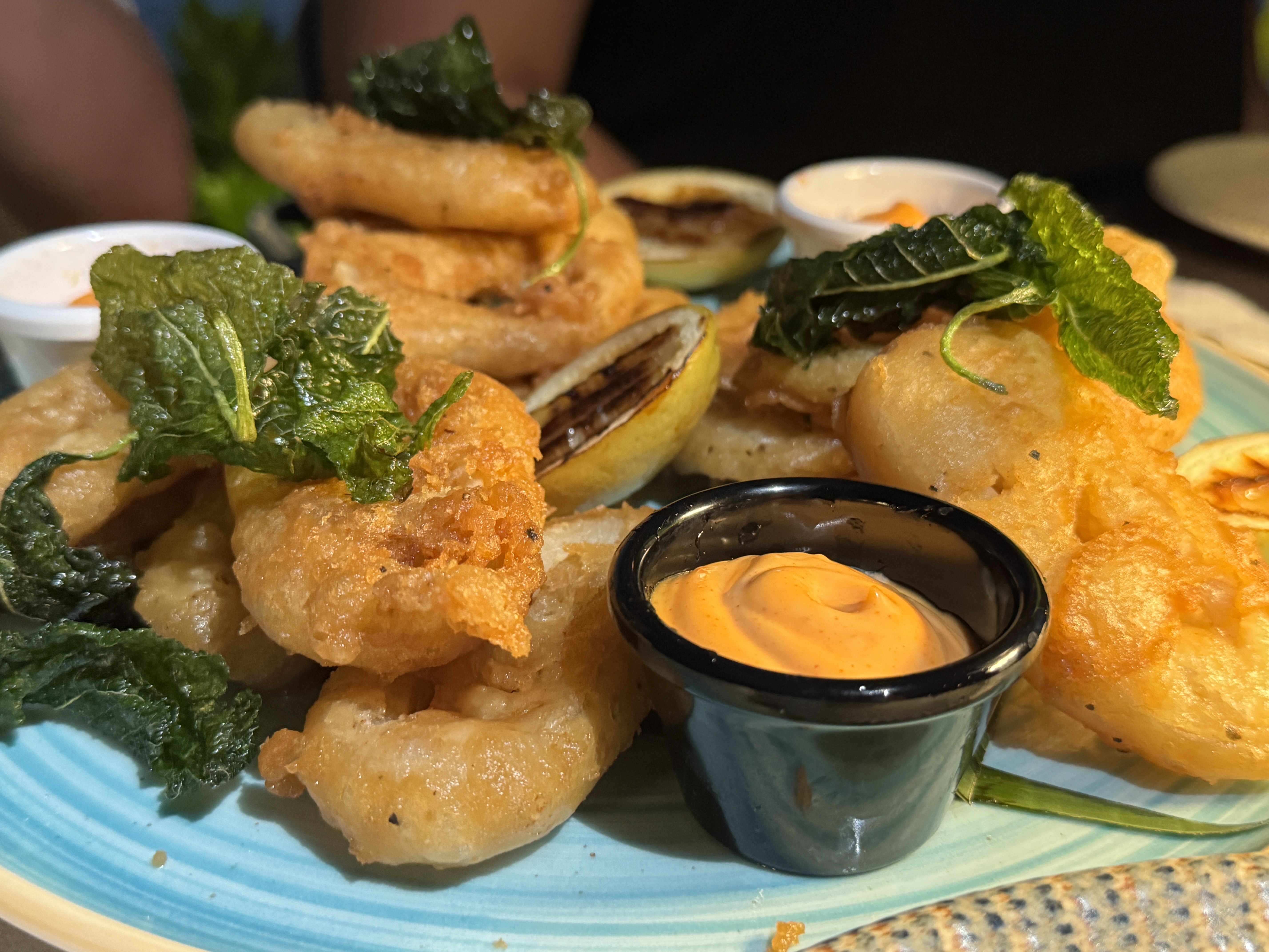 Sheraton Tokoriki Island Seafood platter with battered prawns calamari dipping sauce