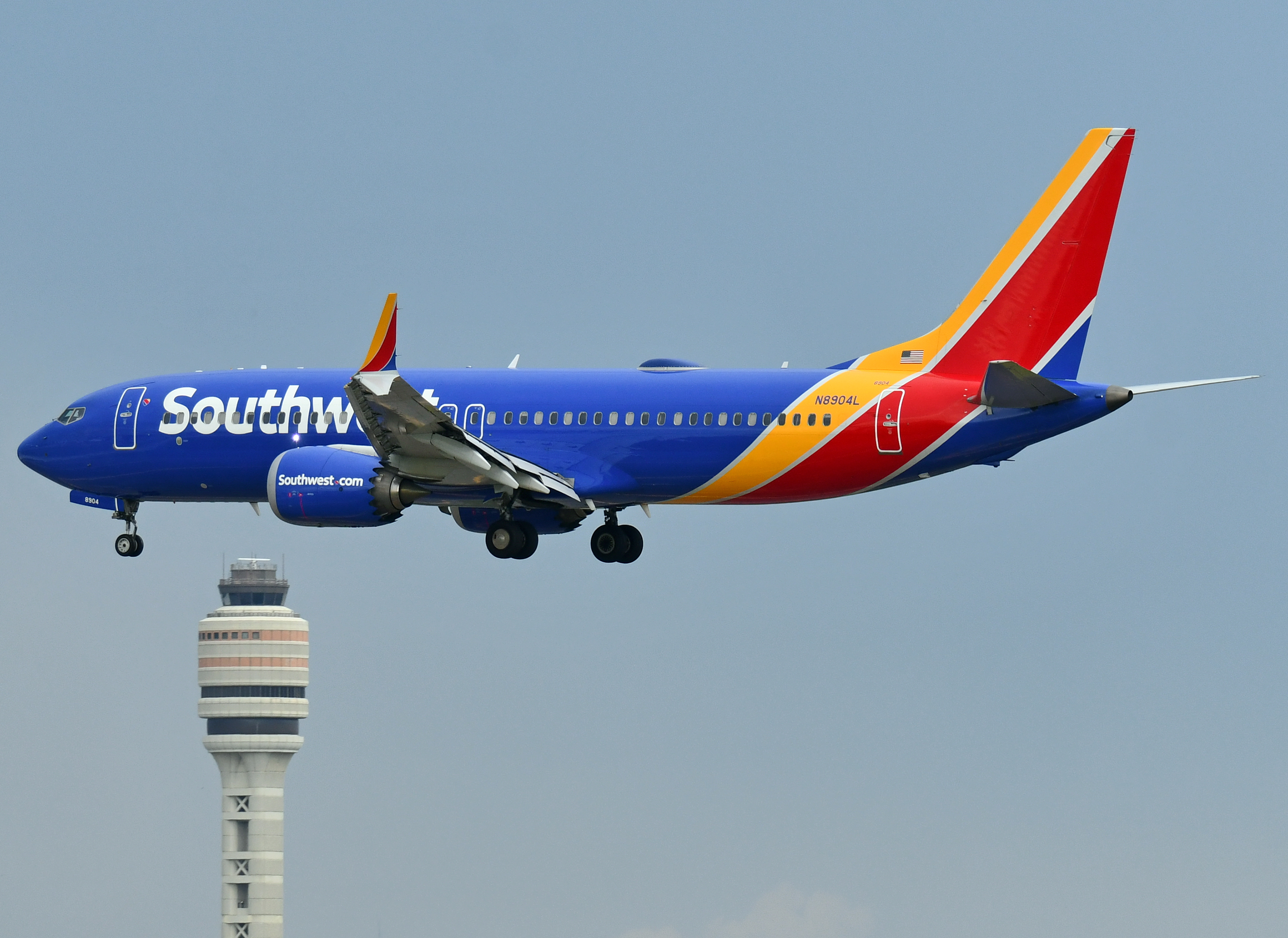 Southwest Airplane On An Airport Runway Southwest B737 Max 8 landing MCO tower