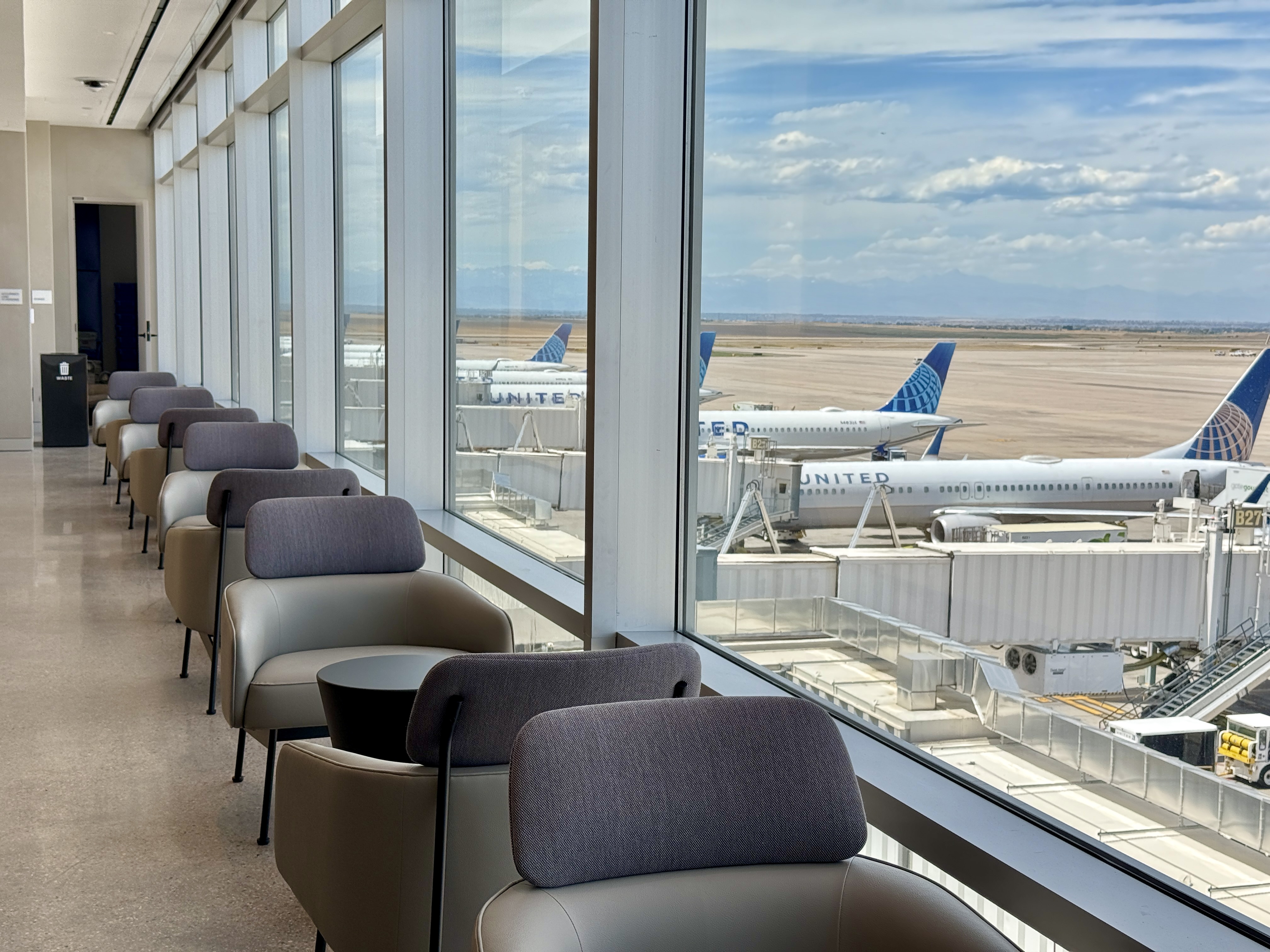 United Club Denver B West Armchairs Along Window United Club Denver B West Armchairs Along Window