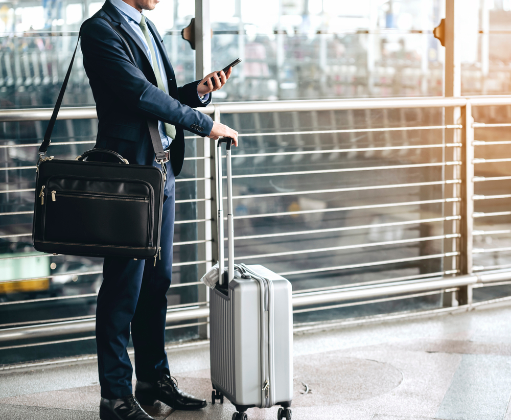 businessman with carry on luggage
