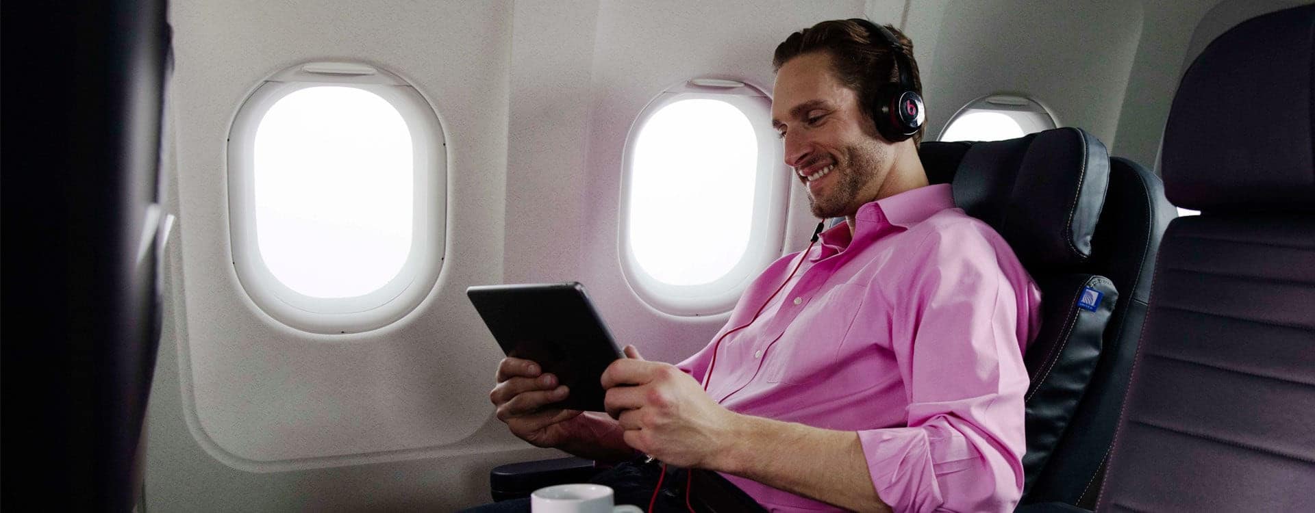United first class man on tablet United first class man on tablet