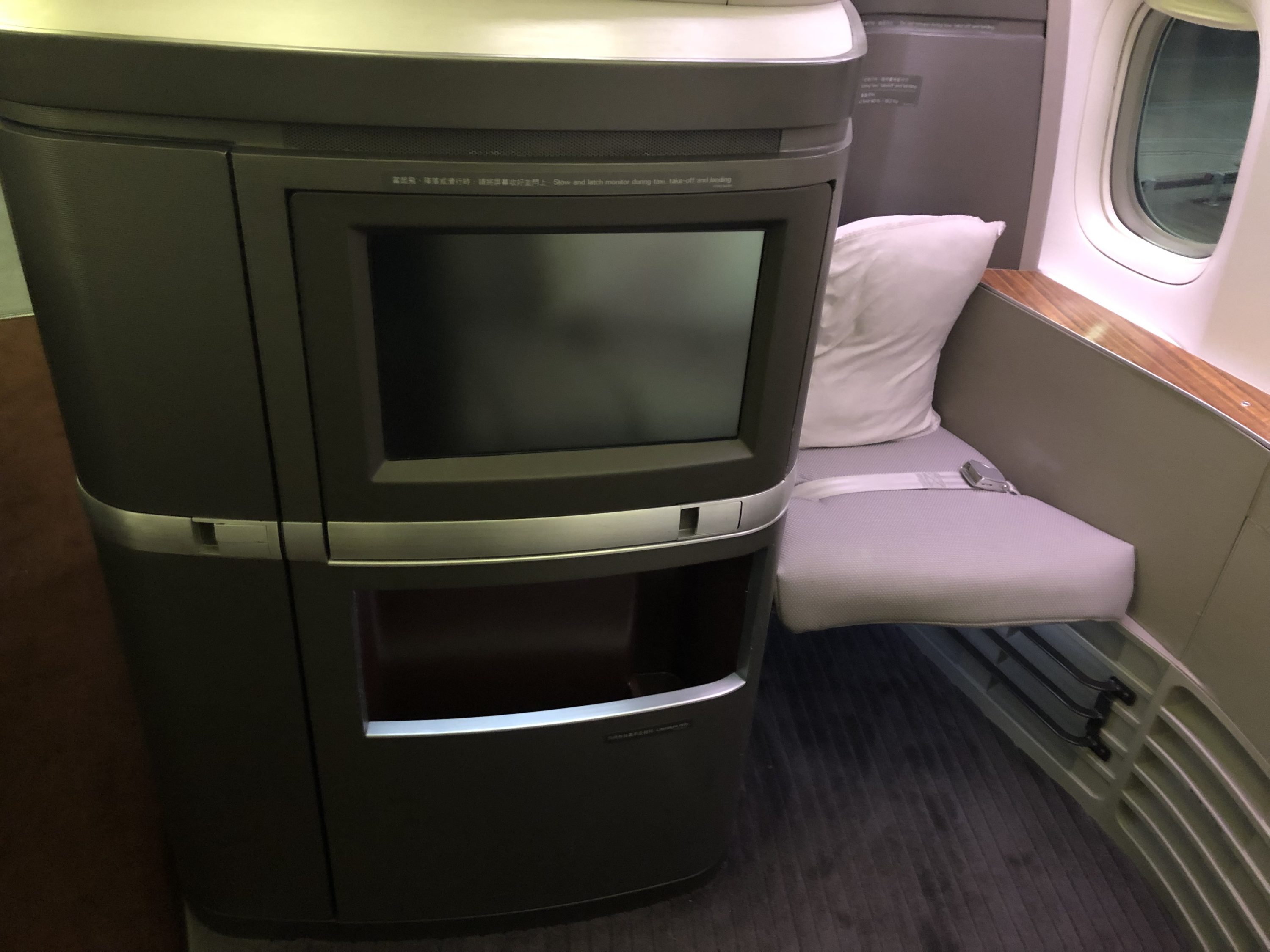 Cathay Pacific 777 first class in-flight monitor and ottoman