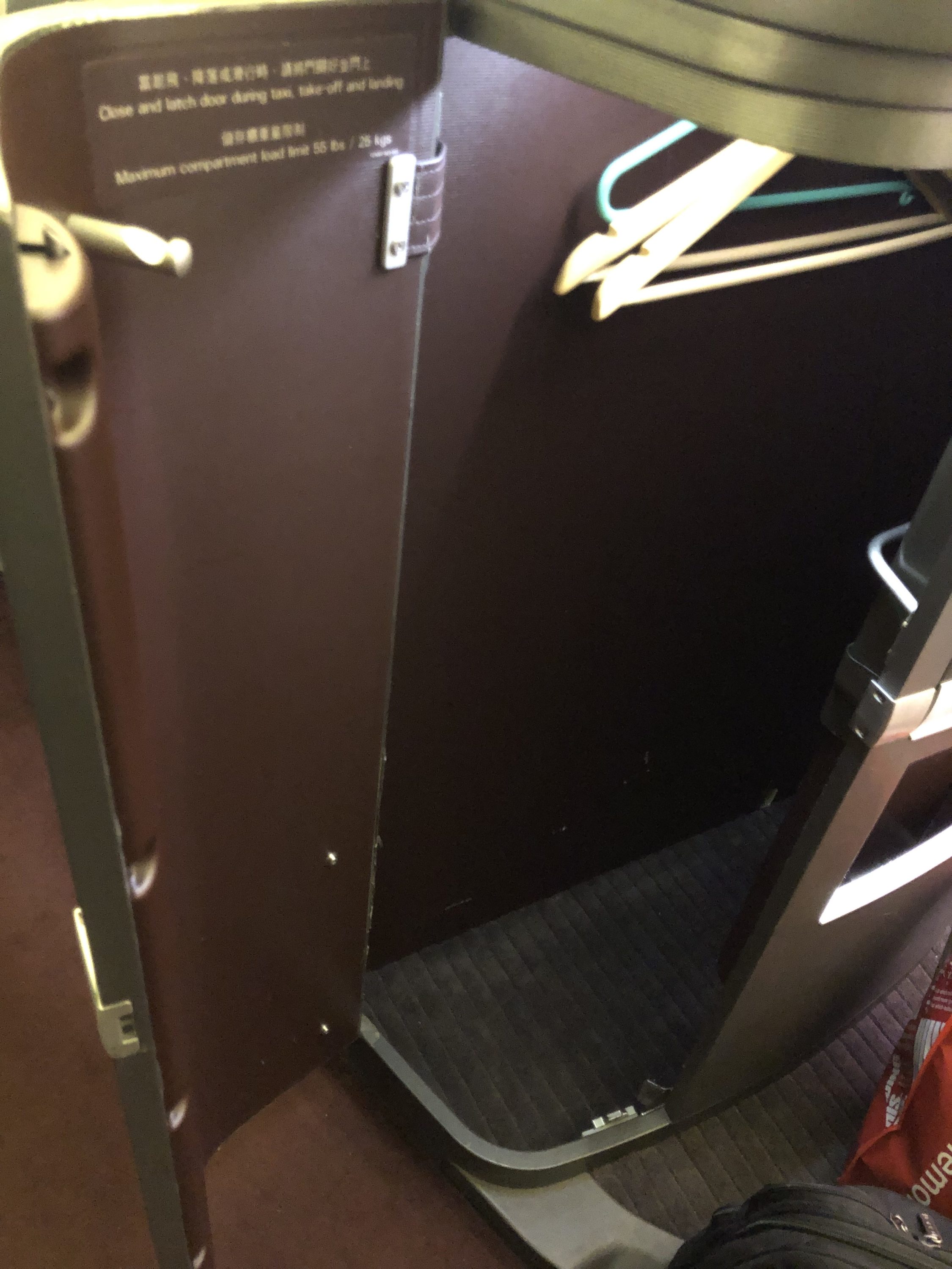 Cathay Pacific 777 first class large storage compartment inside