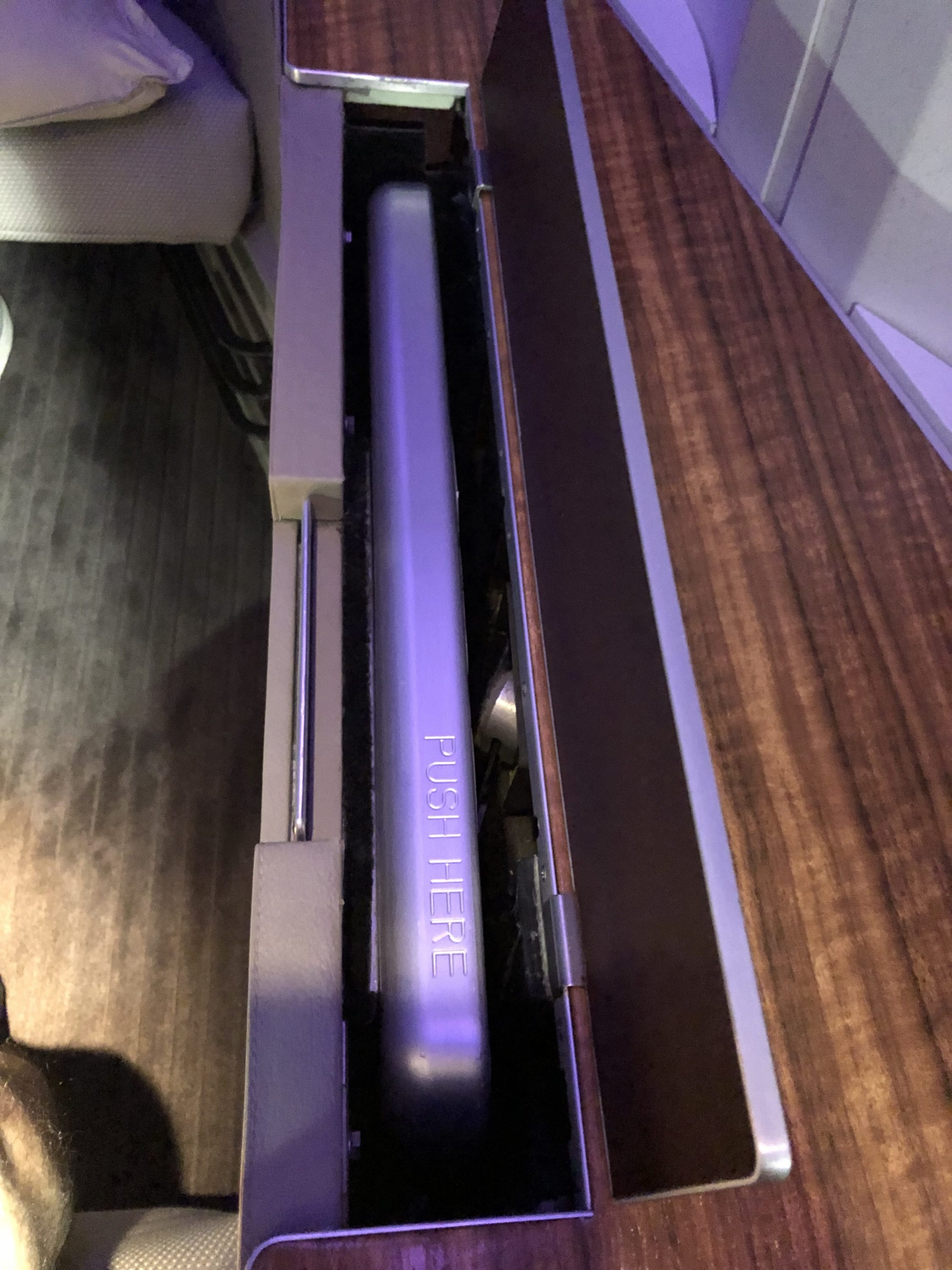Cathay Pacific 777 first class tray table stowed