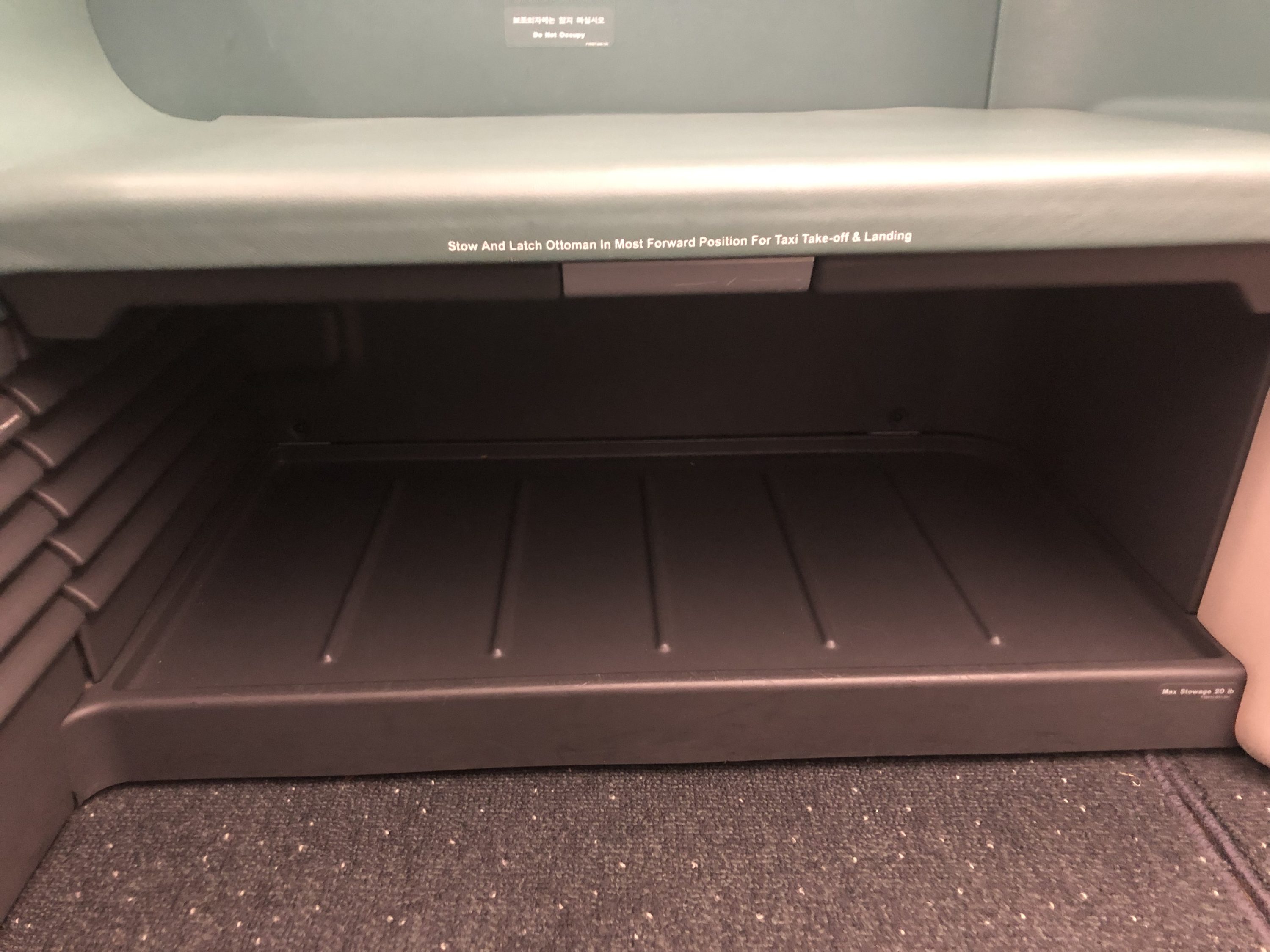 Korean Air first class under seat storage 1