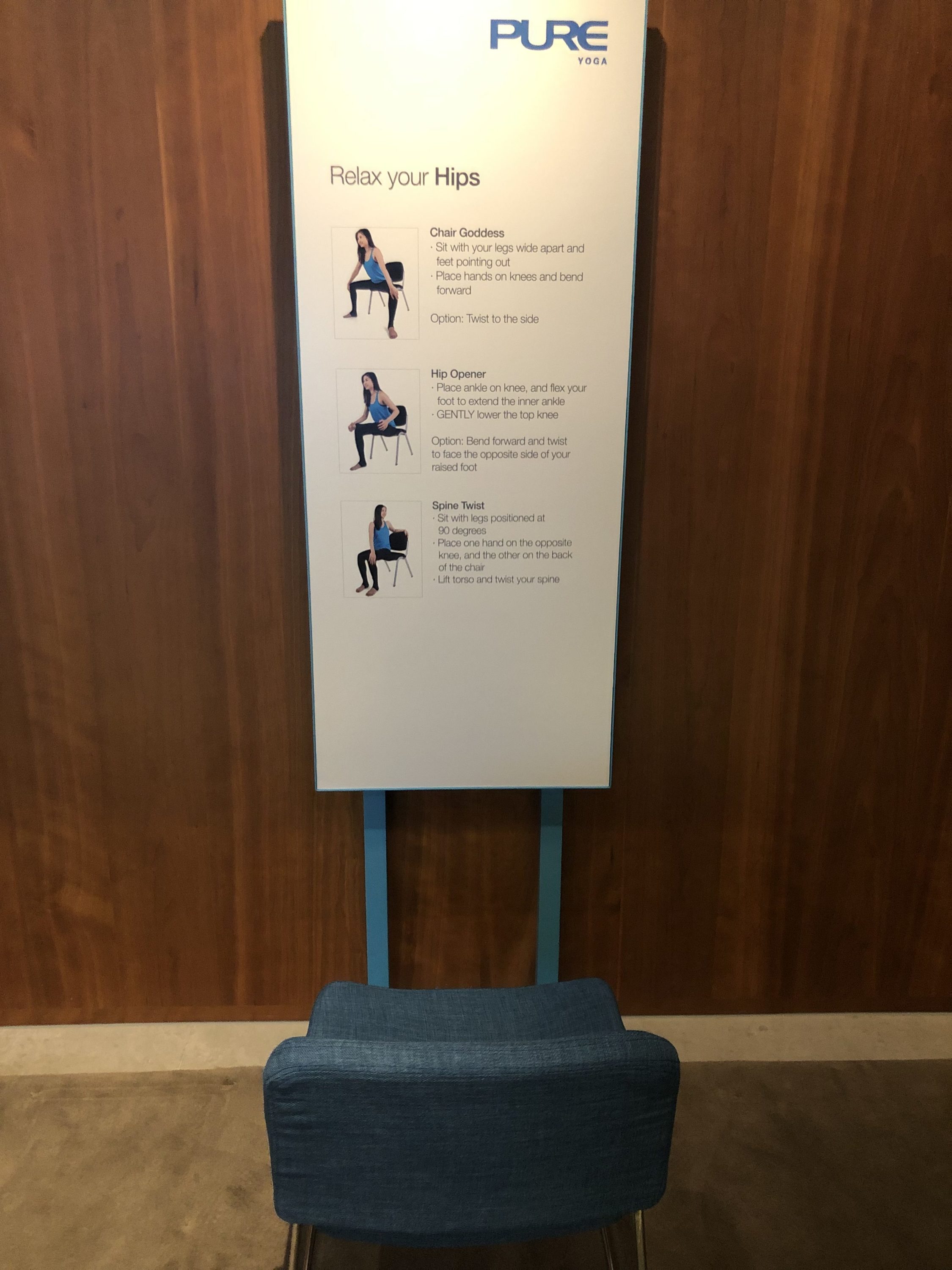 The Pier, Business at Hong Kong International Airport seated stretching 2