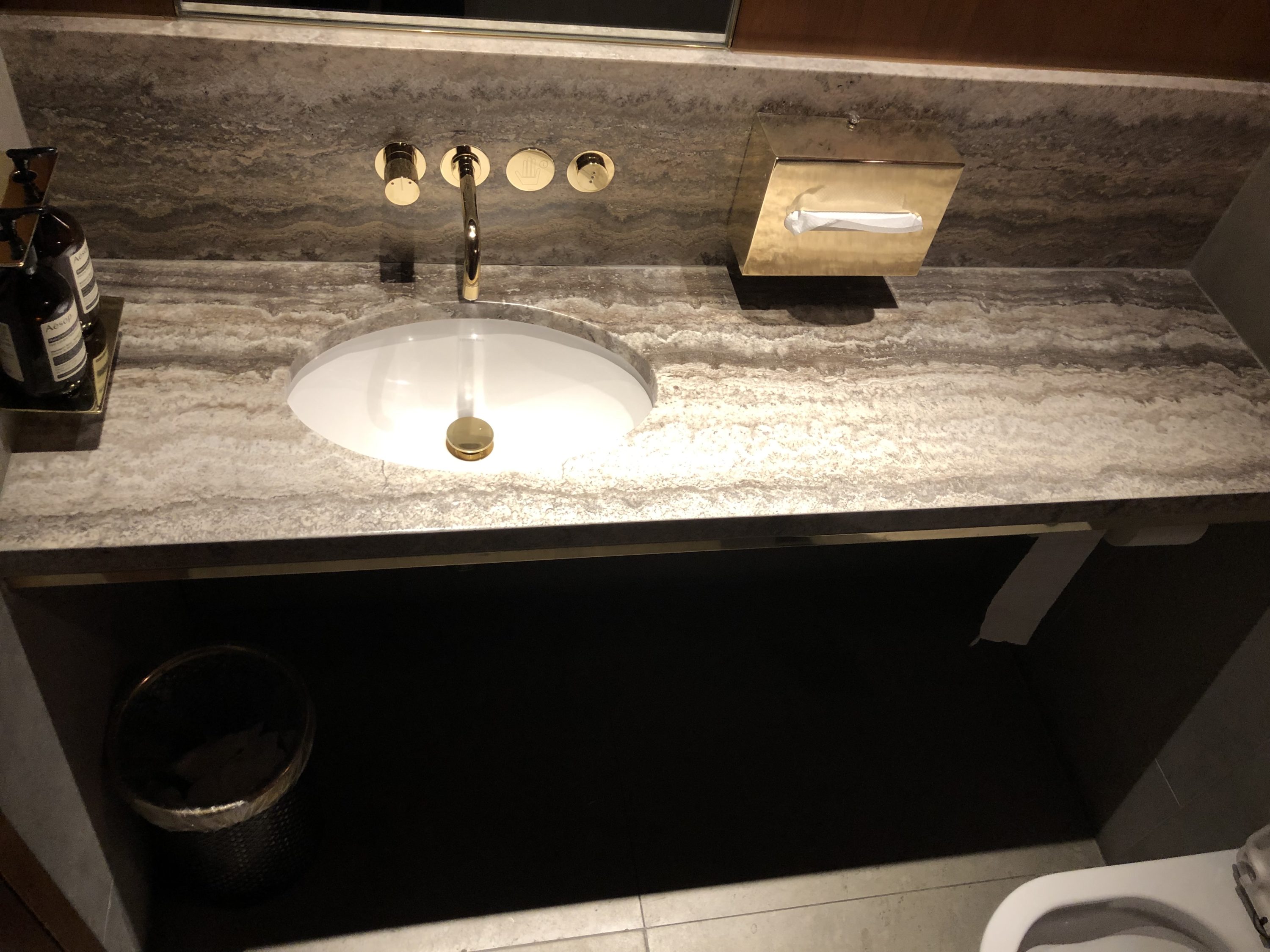 The Pier, First at Hong Kong International Airport sinks within restroom stalls