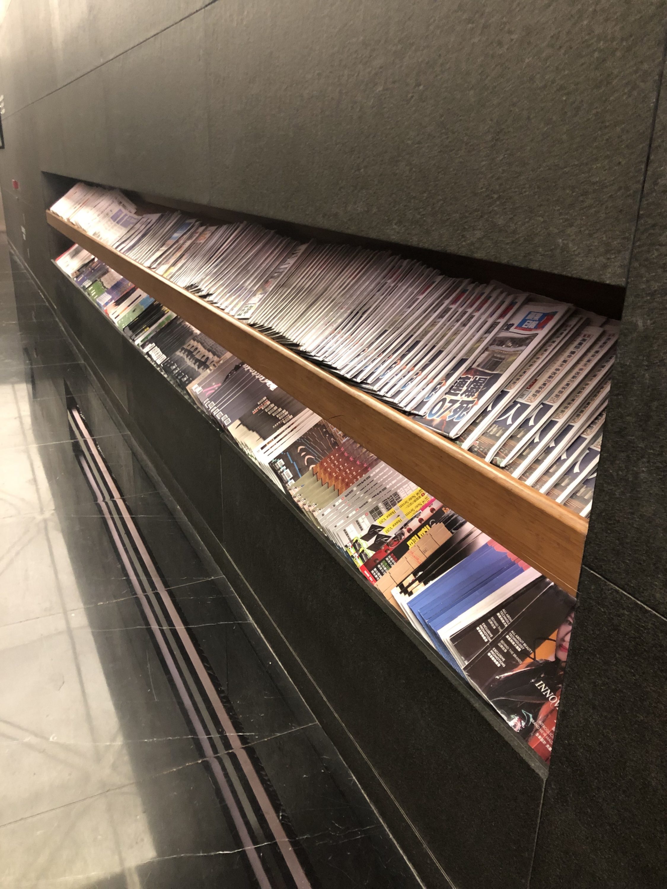 The Wing, Business at Hong Kong International Airport literature aisle