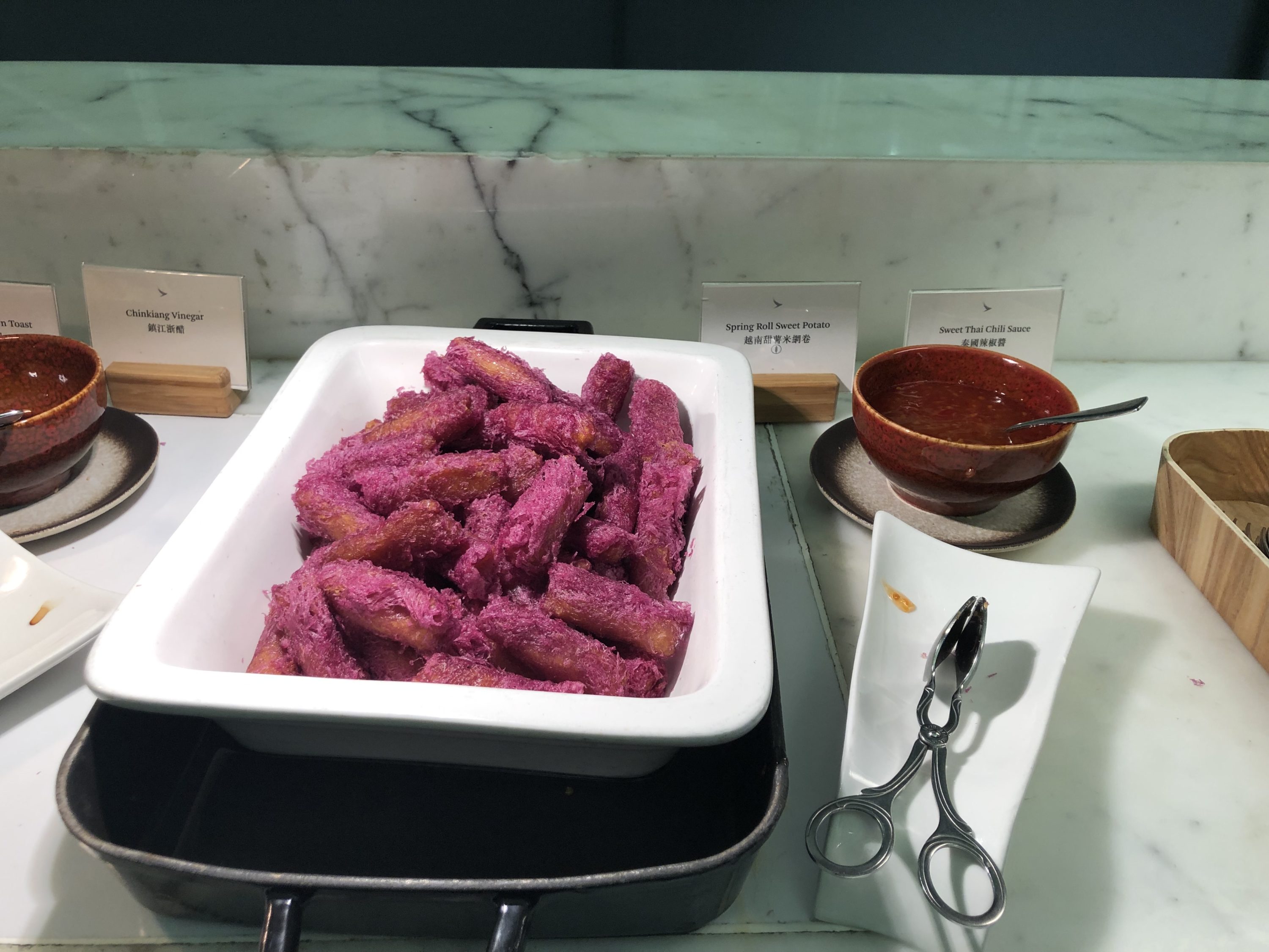 The Wing, Business at Hong Kong International Airport long bar spring rolls