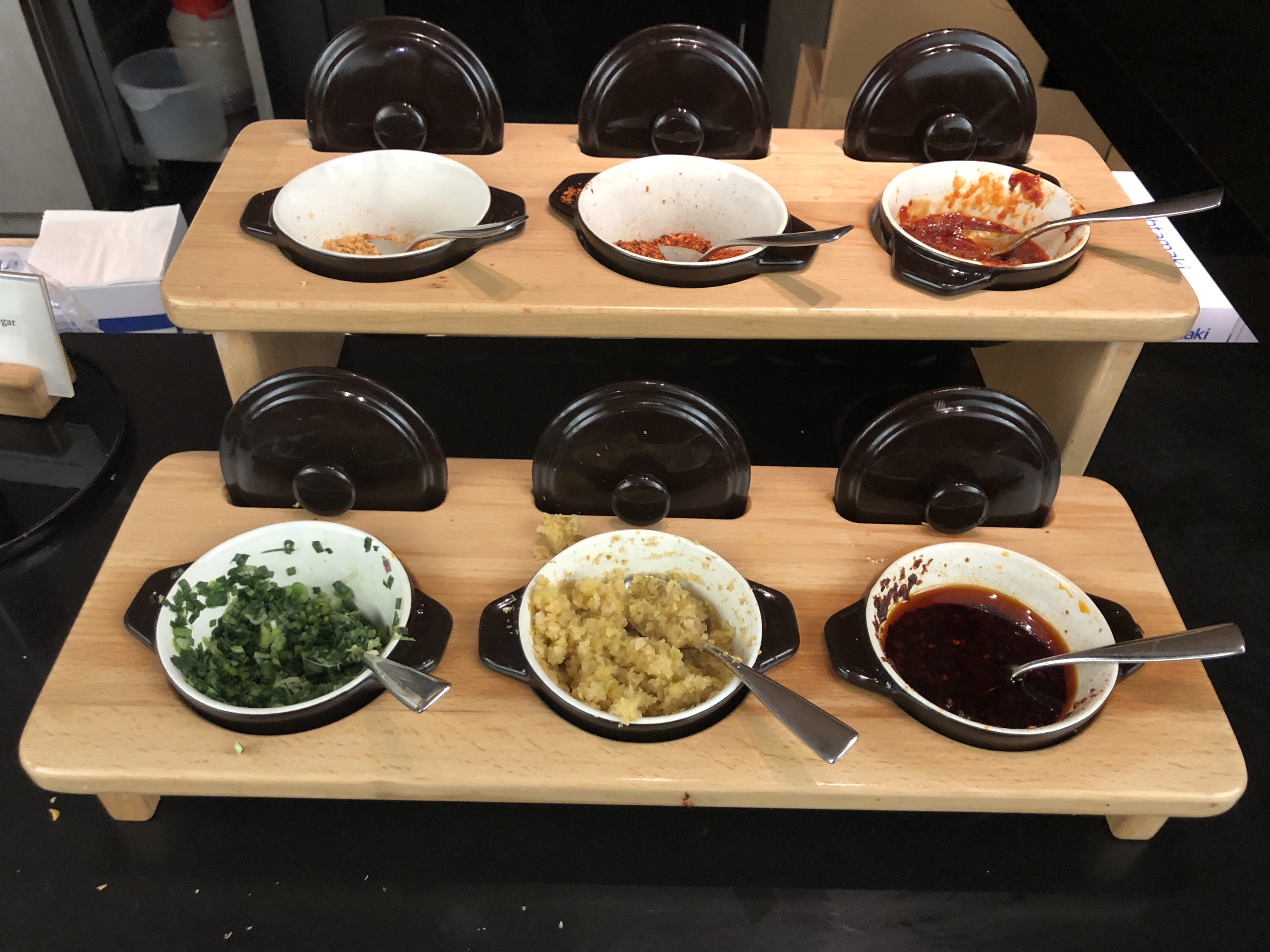 The Wing, Business at Hong Kong International Airport noodle bar condiments