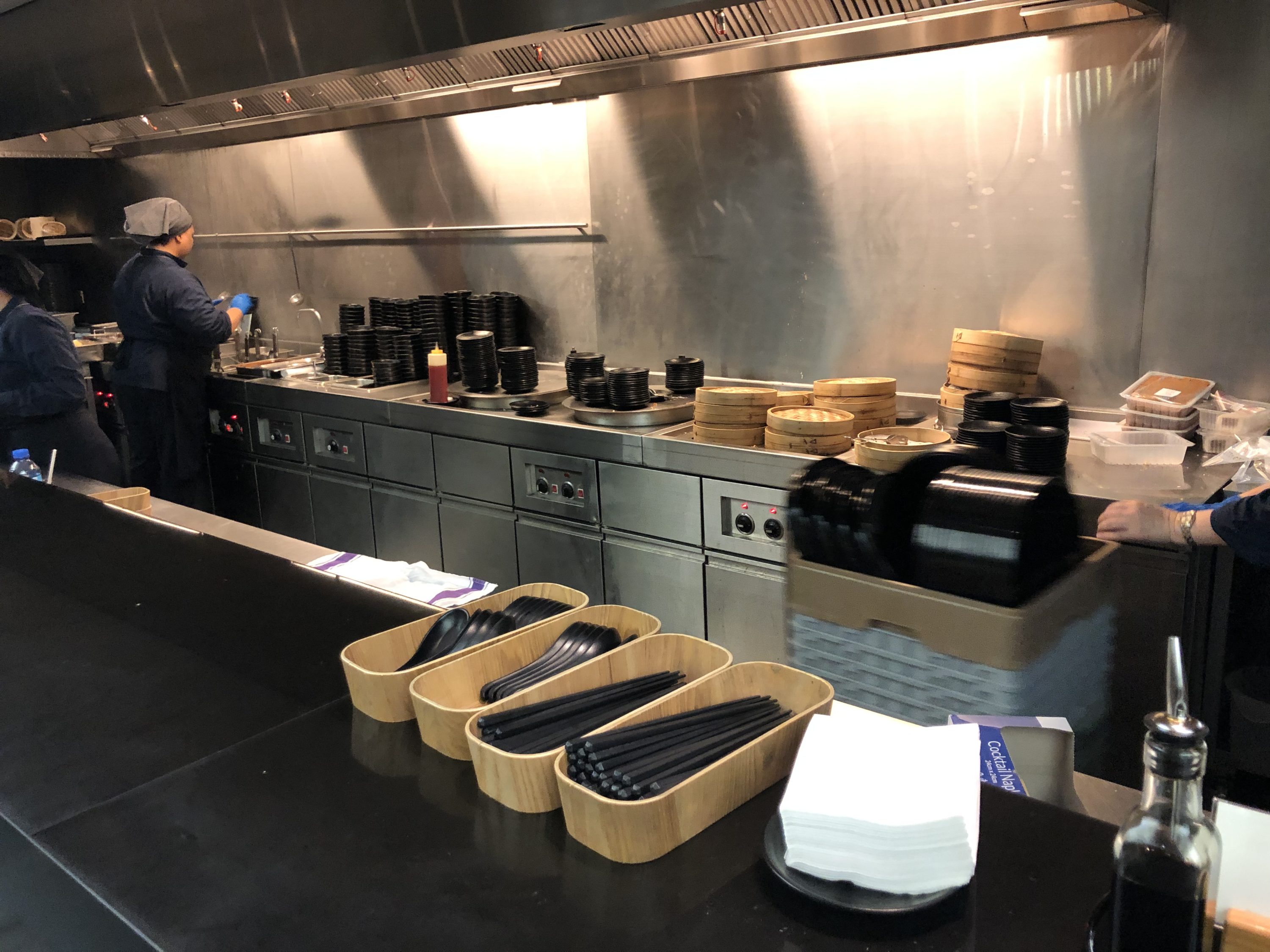 The Wing, Business at Hong Kong International Airport noodle bar open air kitchen