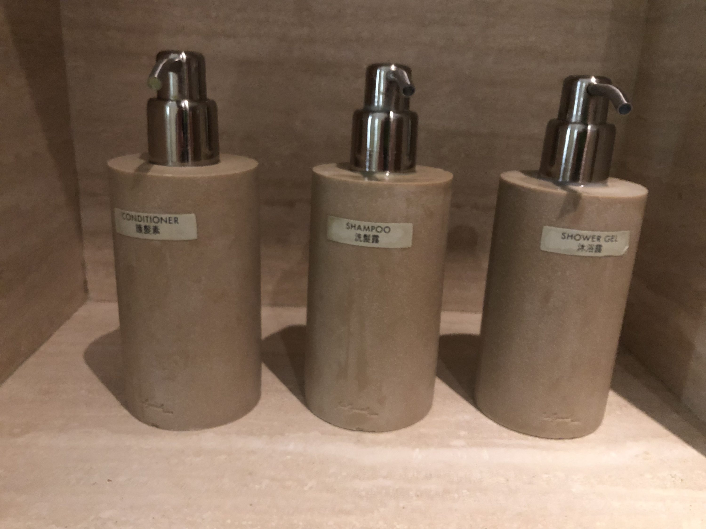 The Wing, First at Hong Kong International Airport cabana shower amenities