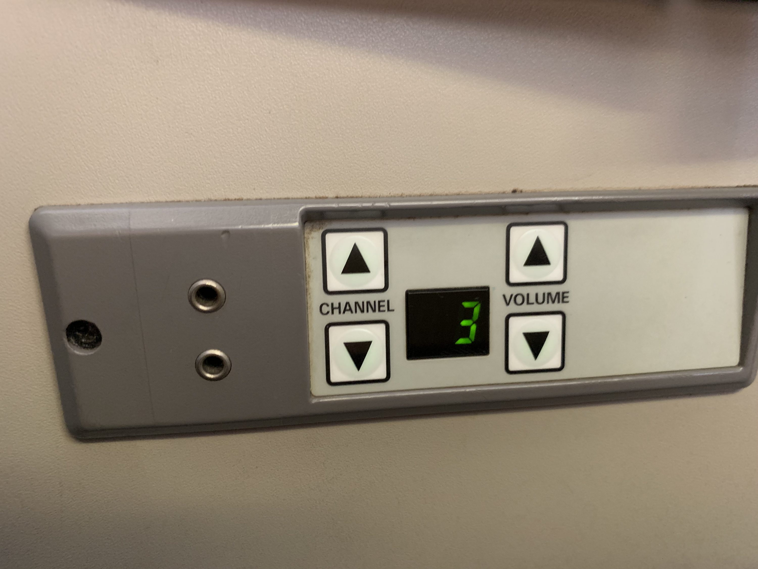 Vietnam Airlines A321 business class seatside headphone and channel controls