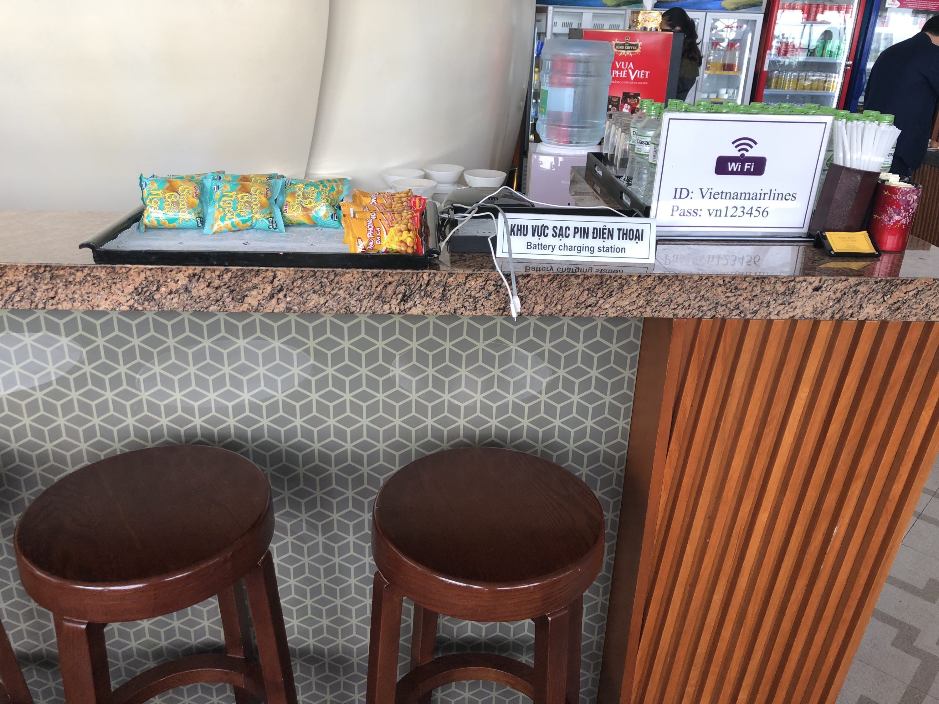 Vietnam Airlines Lotus Lounge Hanoi charging and snack station
