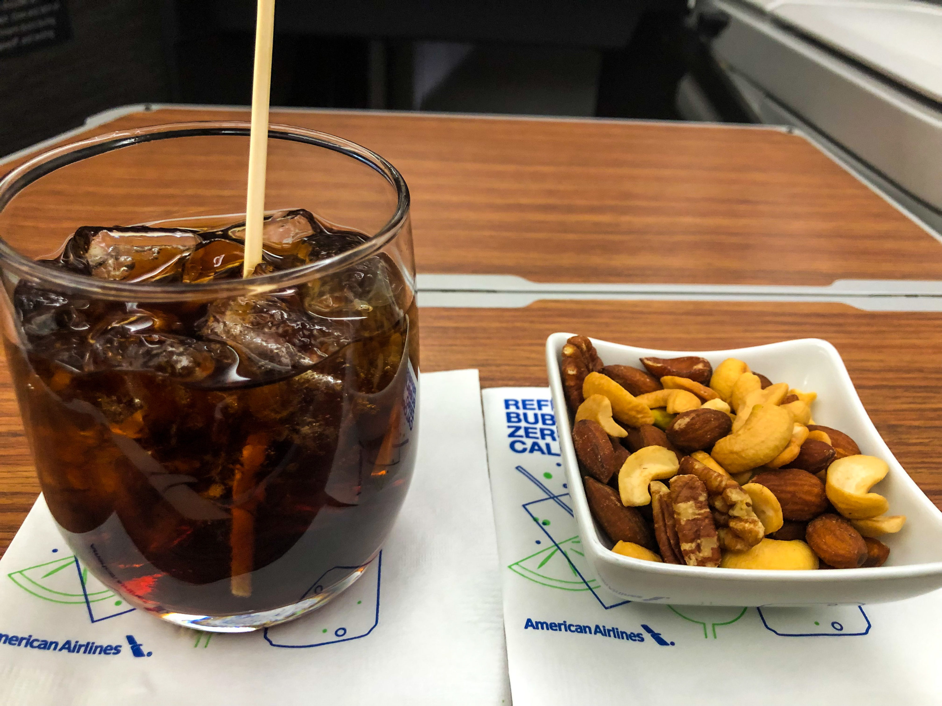 American Airlines 787-9 Flagship Business Class soda and warm nuts close-up
