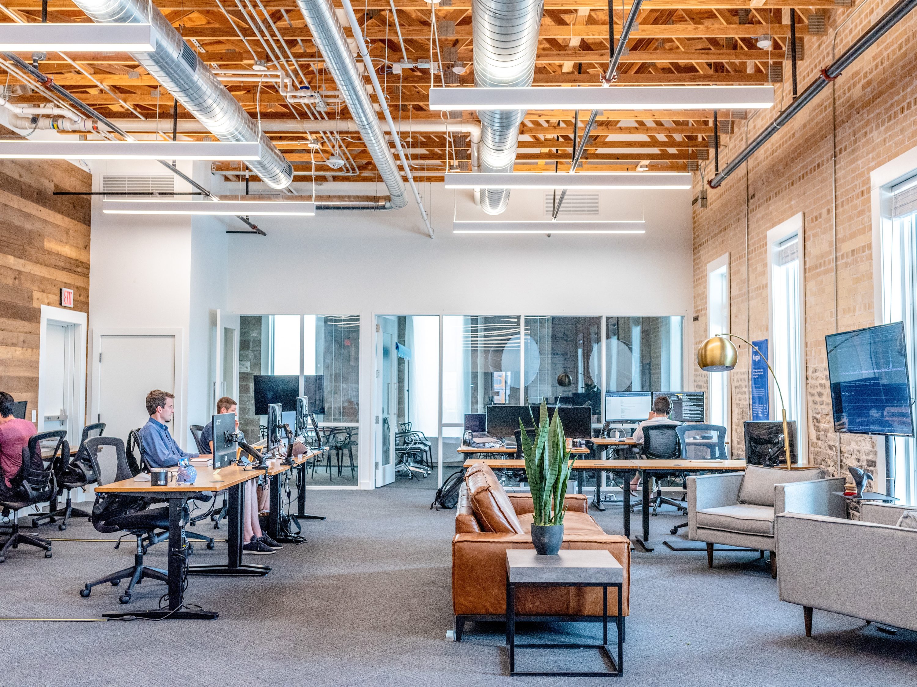 Clean Office With People Working on Computers