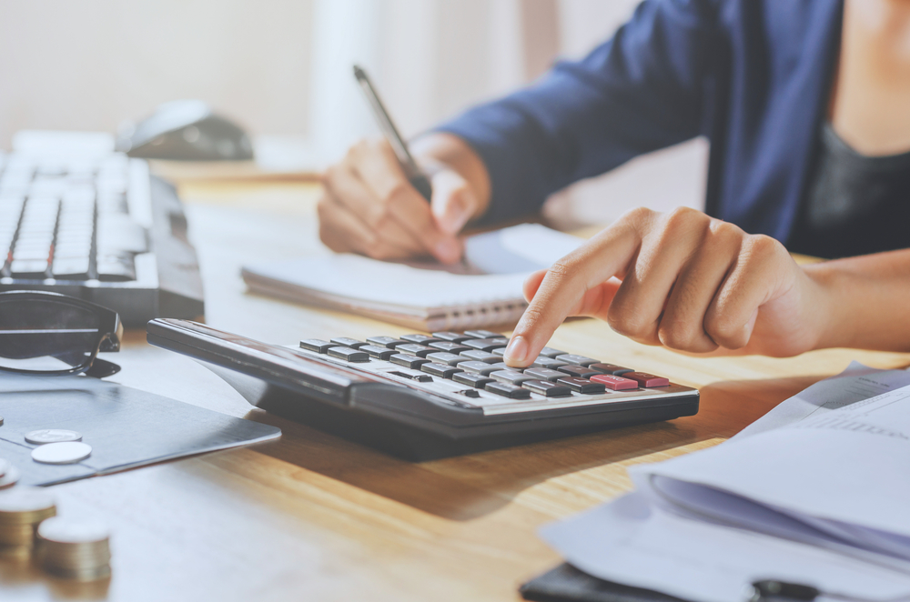 Person Using Calculator