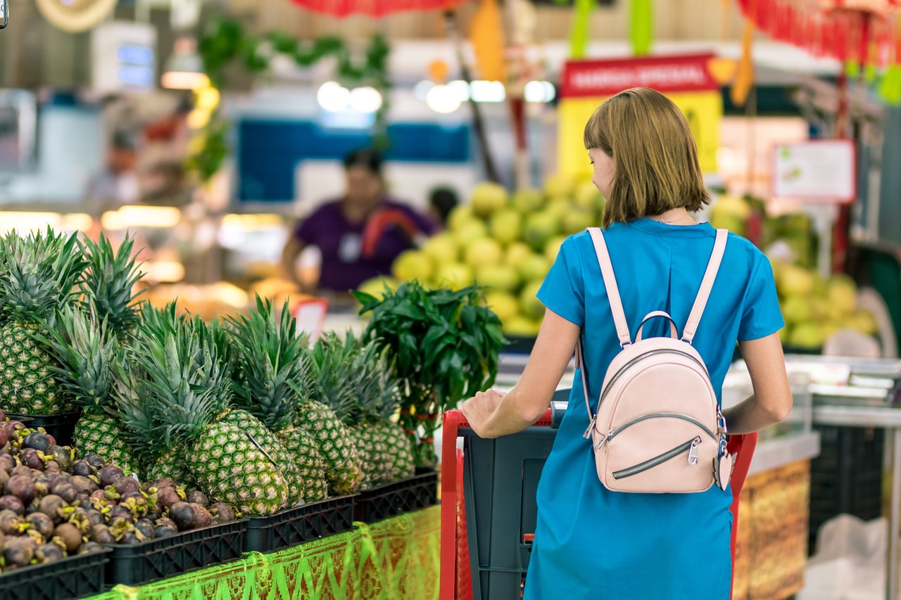 Woman shopping in grocery store