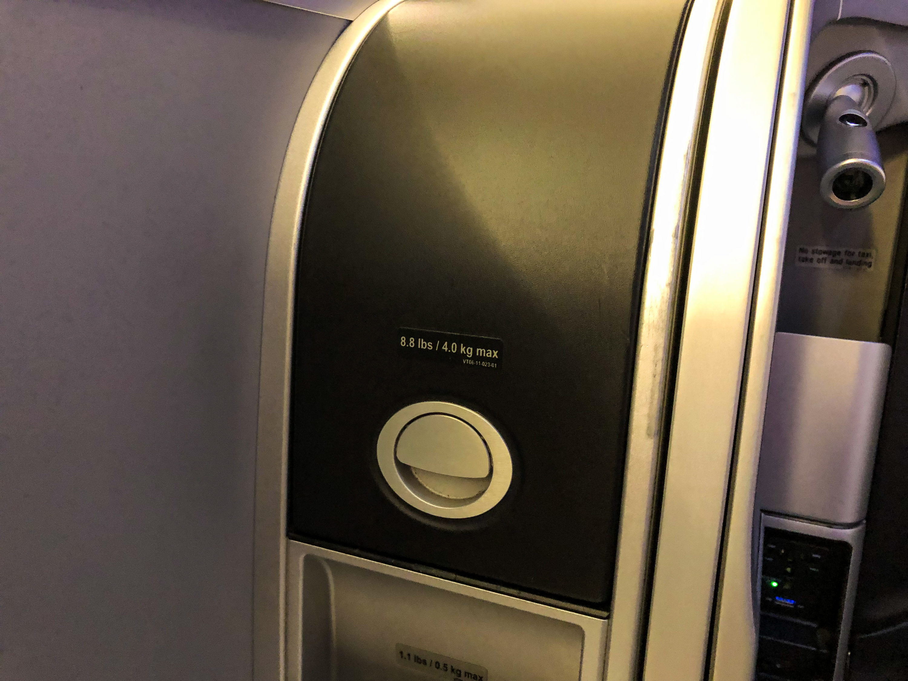 JetBlue Mint A321 right side table storage compartment closed