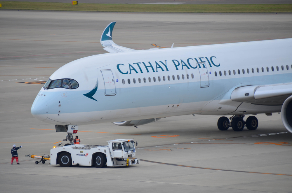 Cathay Pacific Plane on A Runway Cathay Pacific Plane on A Runway