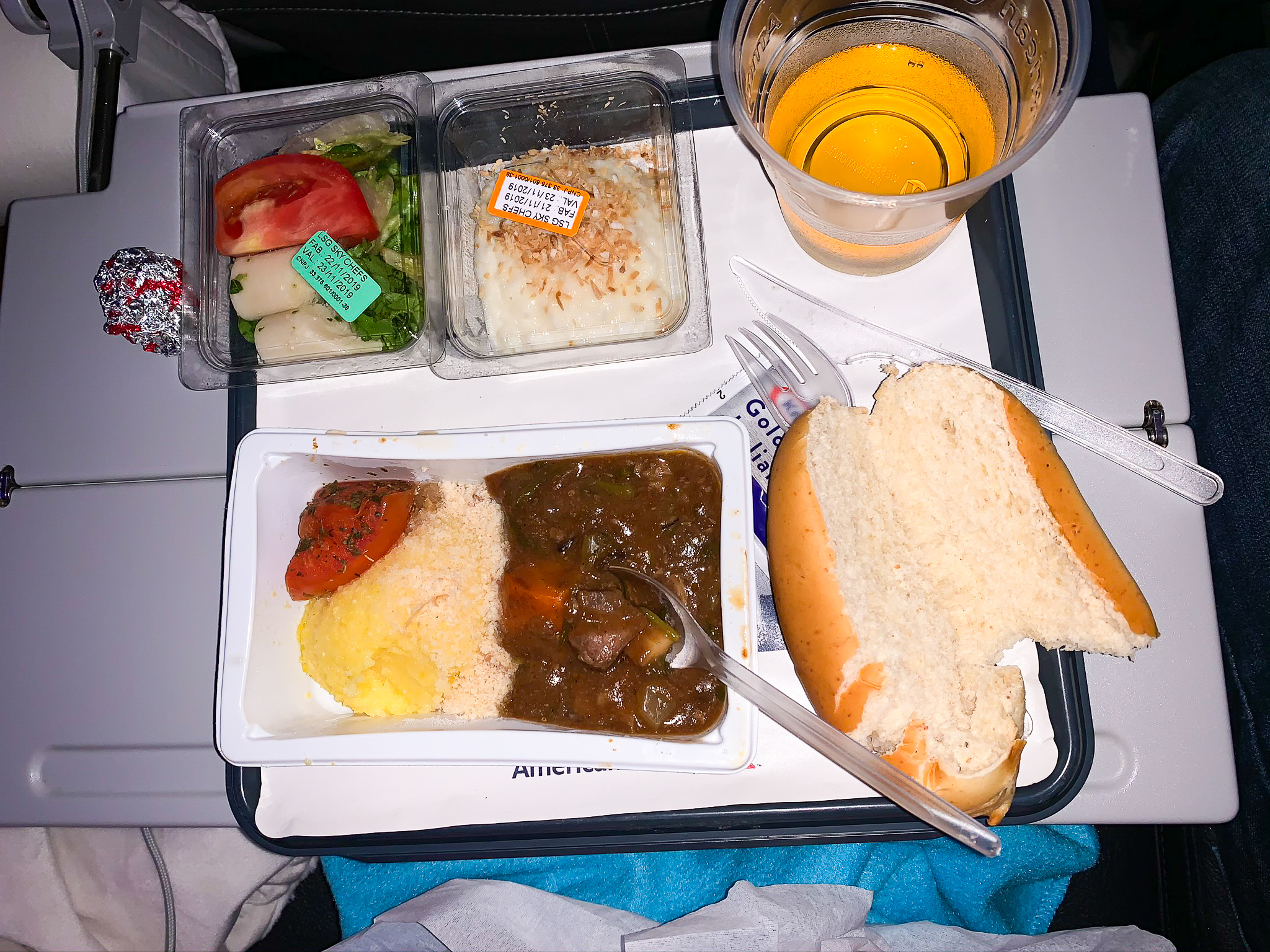 American Airlines 777-200 Economy meal beef stroganoff and apple juice