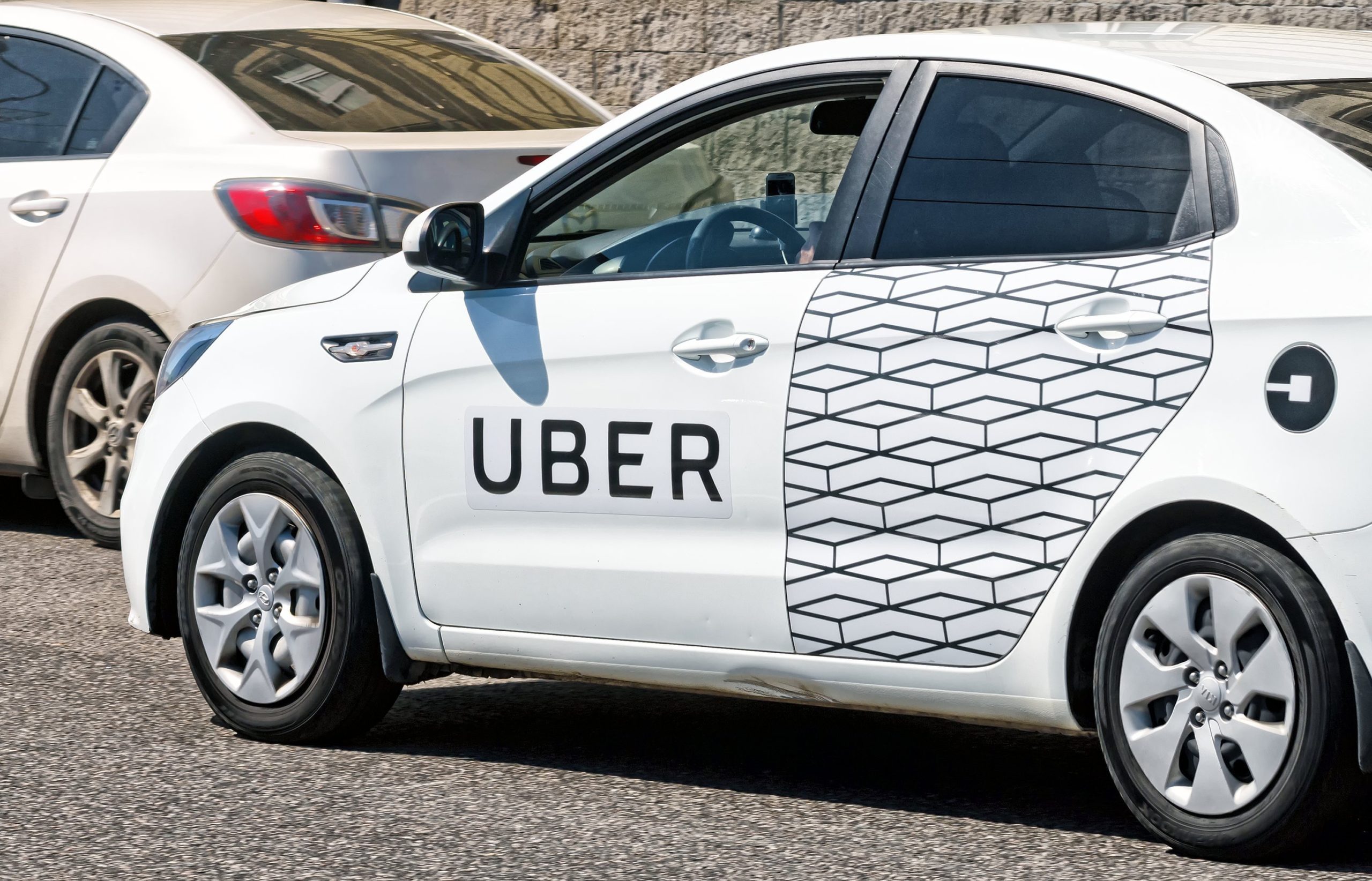 An Uber Branded Car On The Street