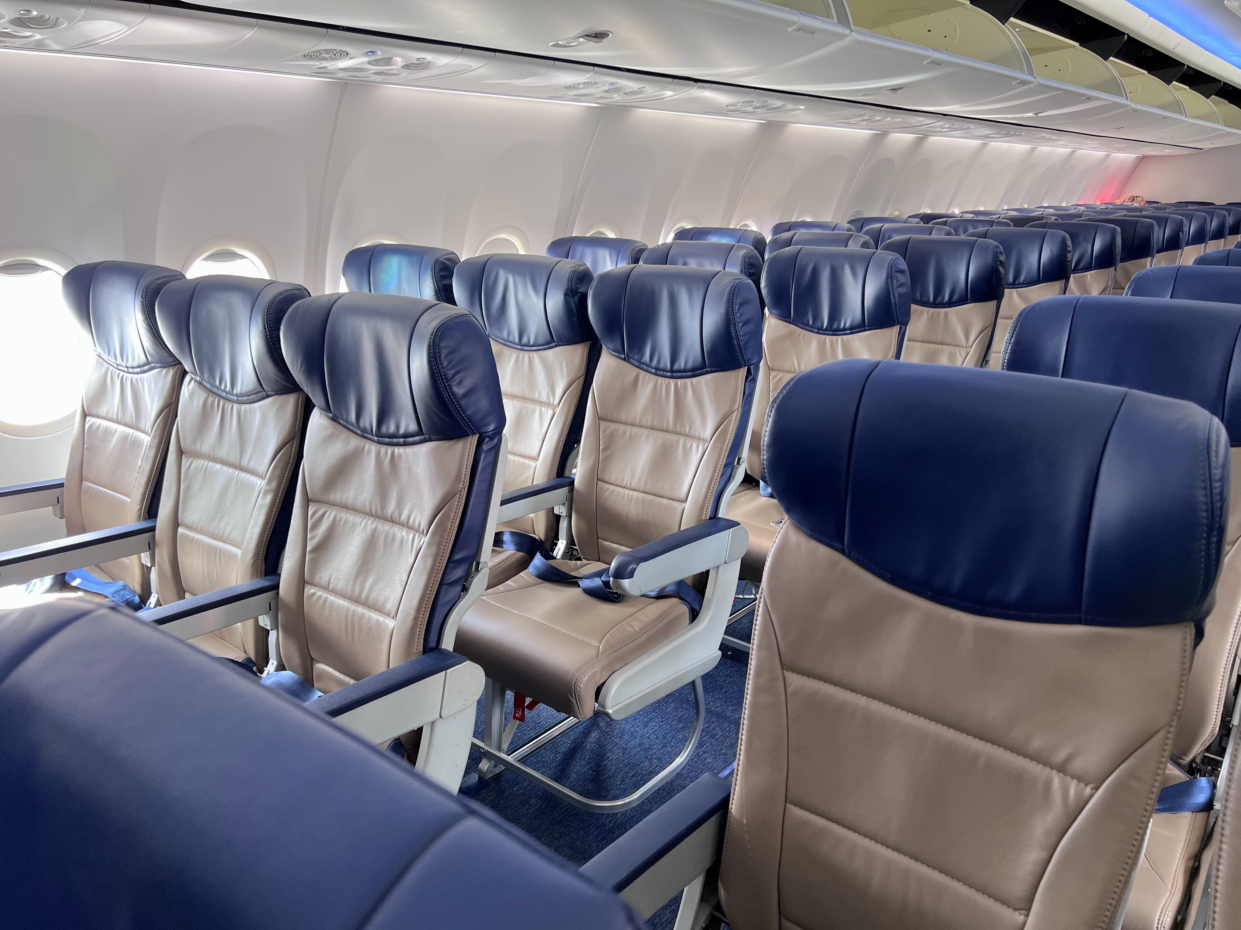 Girl flying Southwest Seats on a Southwest plane