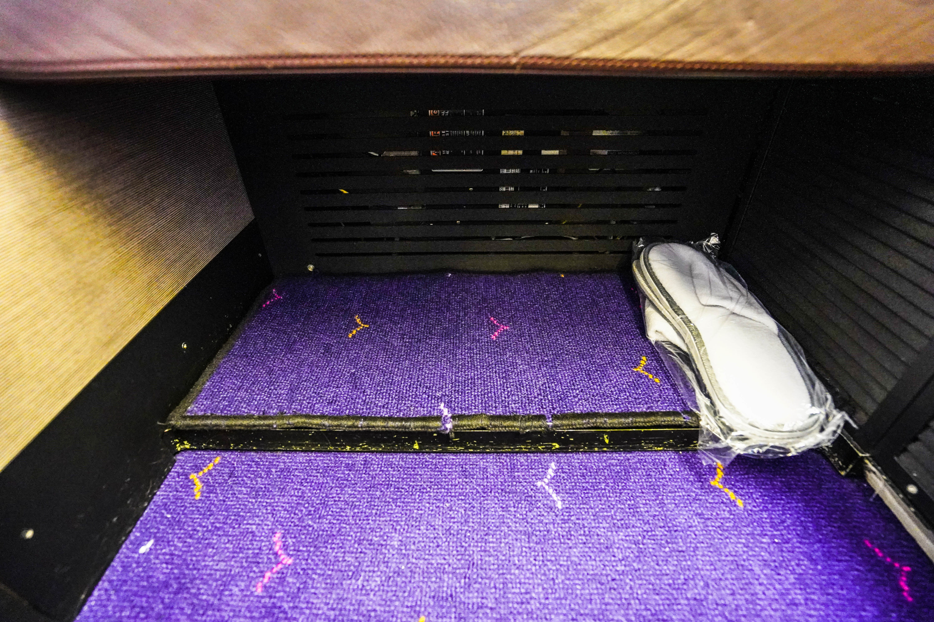 Thai Airways Boeing 747 400 First Class Storage below ottoman