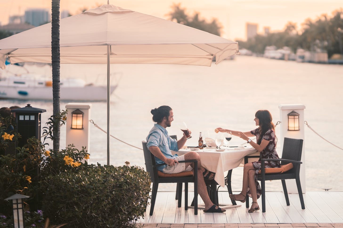 Couple dining out waterfront Couple dining out waterfront
