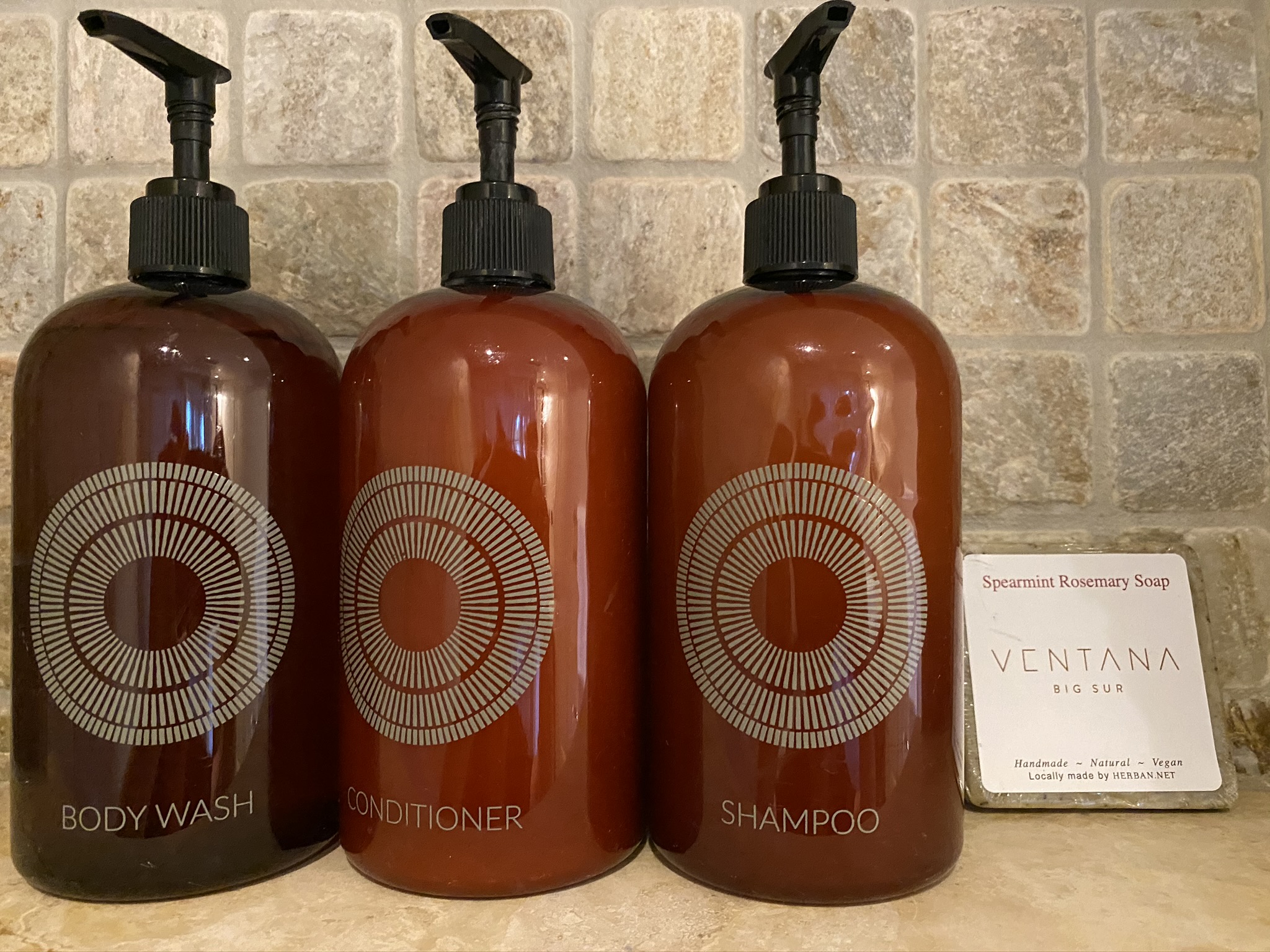 Ventana Big Sur an Alila Resort Ventana fireplace guestroom Body Bliss bath amenities