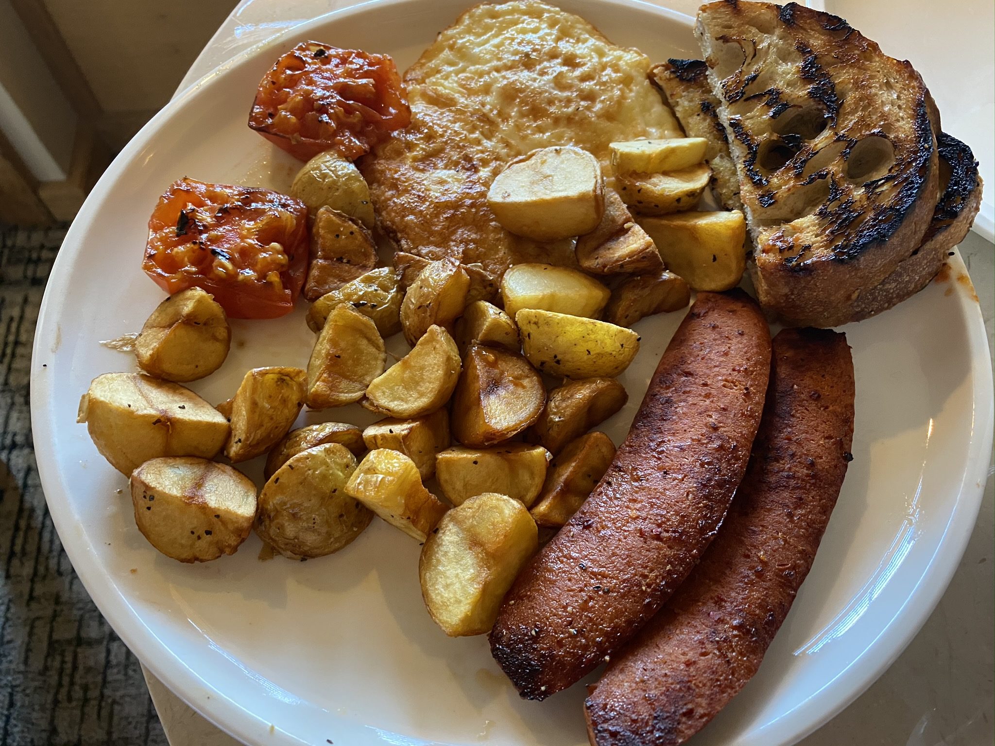 Ventana Big Sur an Alila Resort in room dining Ventana breakfast with Smokehouse hot link