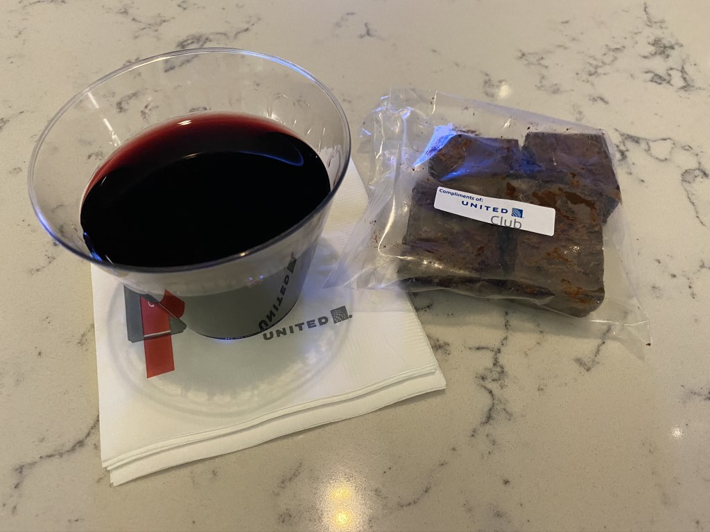 United Club EWR wine and brownie