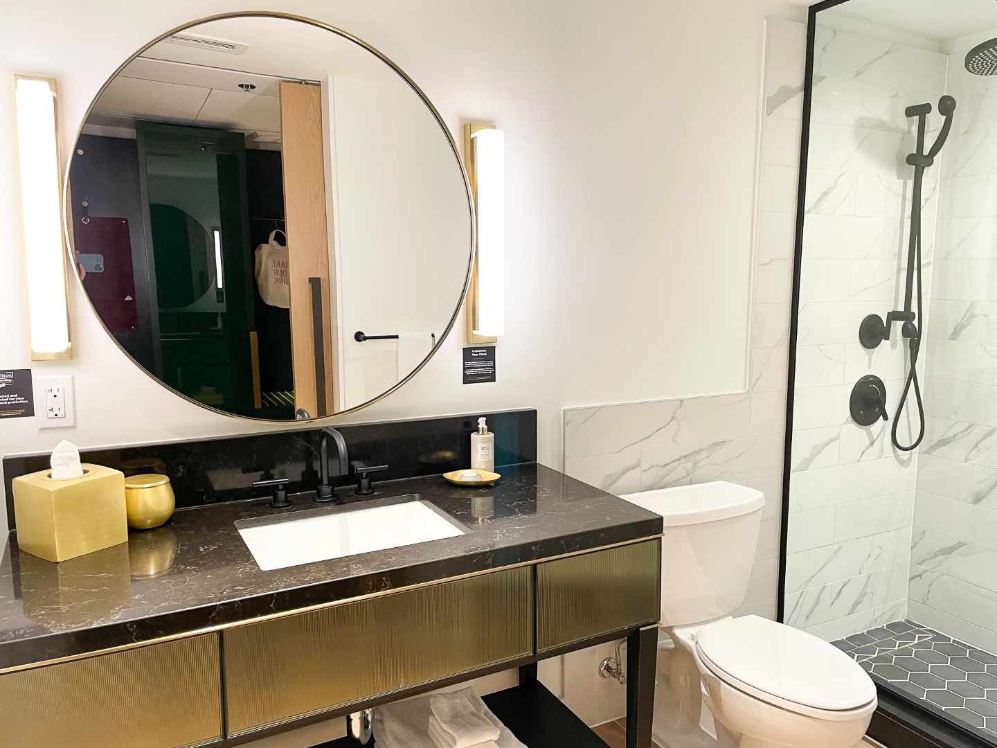 C. Baldwin Curio Collection Hilton Hotel in Houston Texas bathroom mirror