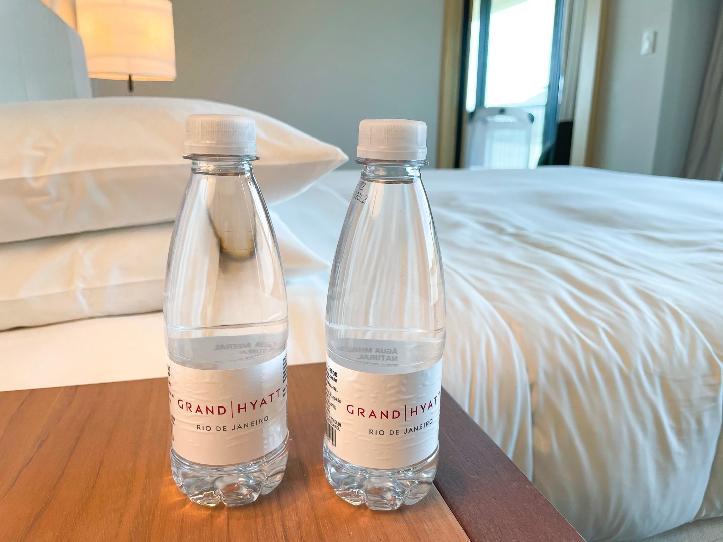 Water bottles next to Grand Hyatt Rio de Janeiro bed