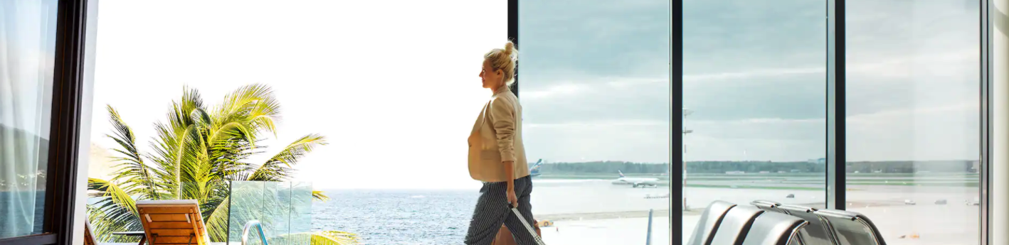 Woman Walking from Airport to Hotel
