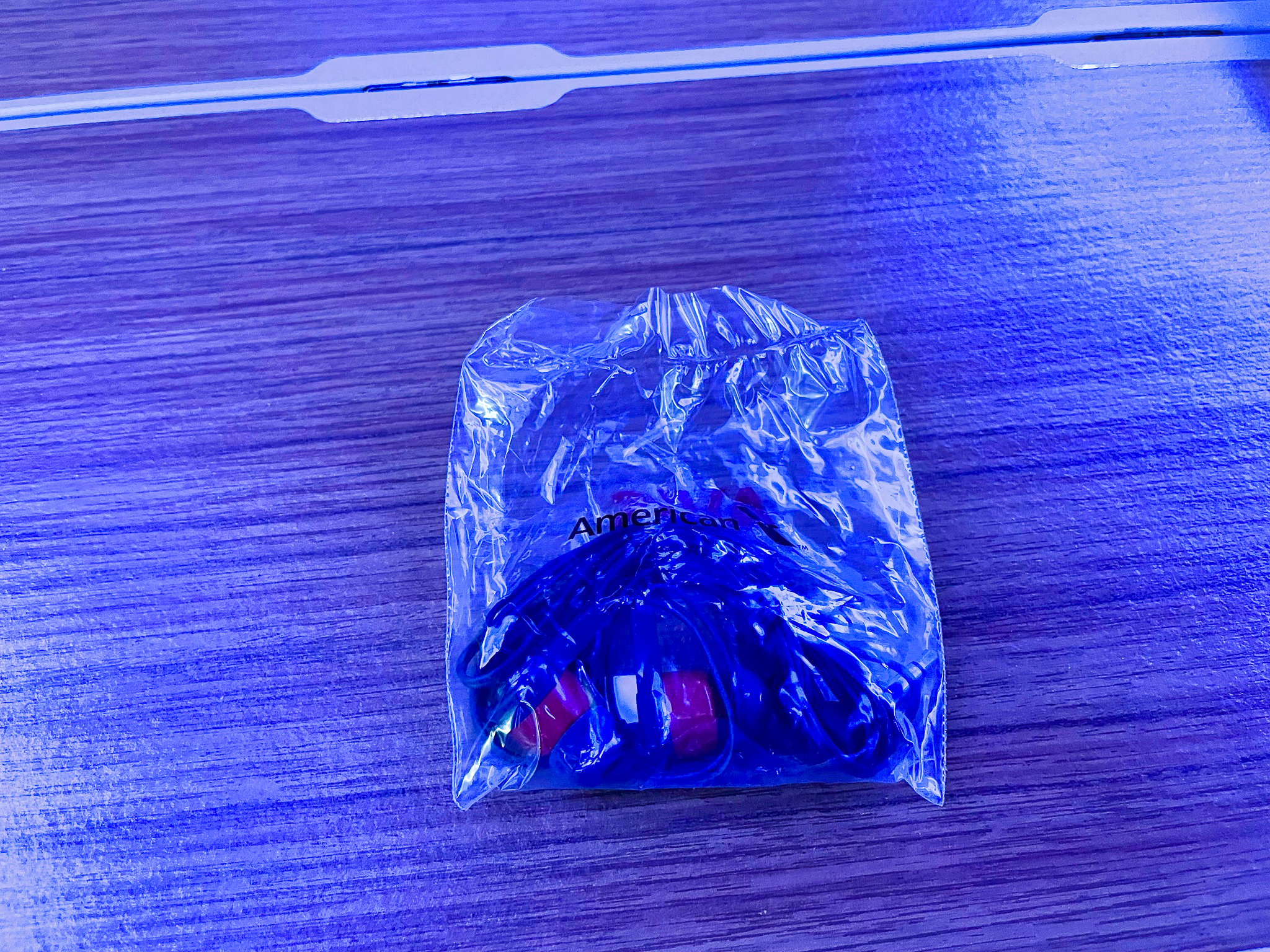 American Airlines First Flagship Business Class Miami to Boston earbuds headphones